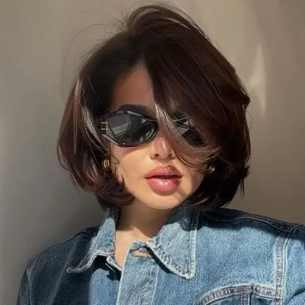 Rounded dark bob with face-framing volume