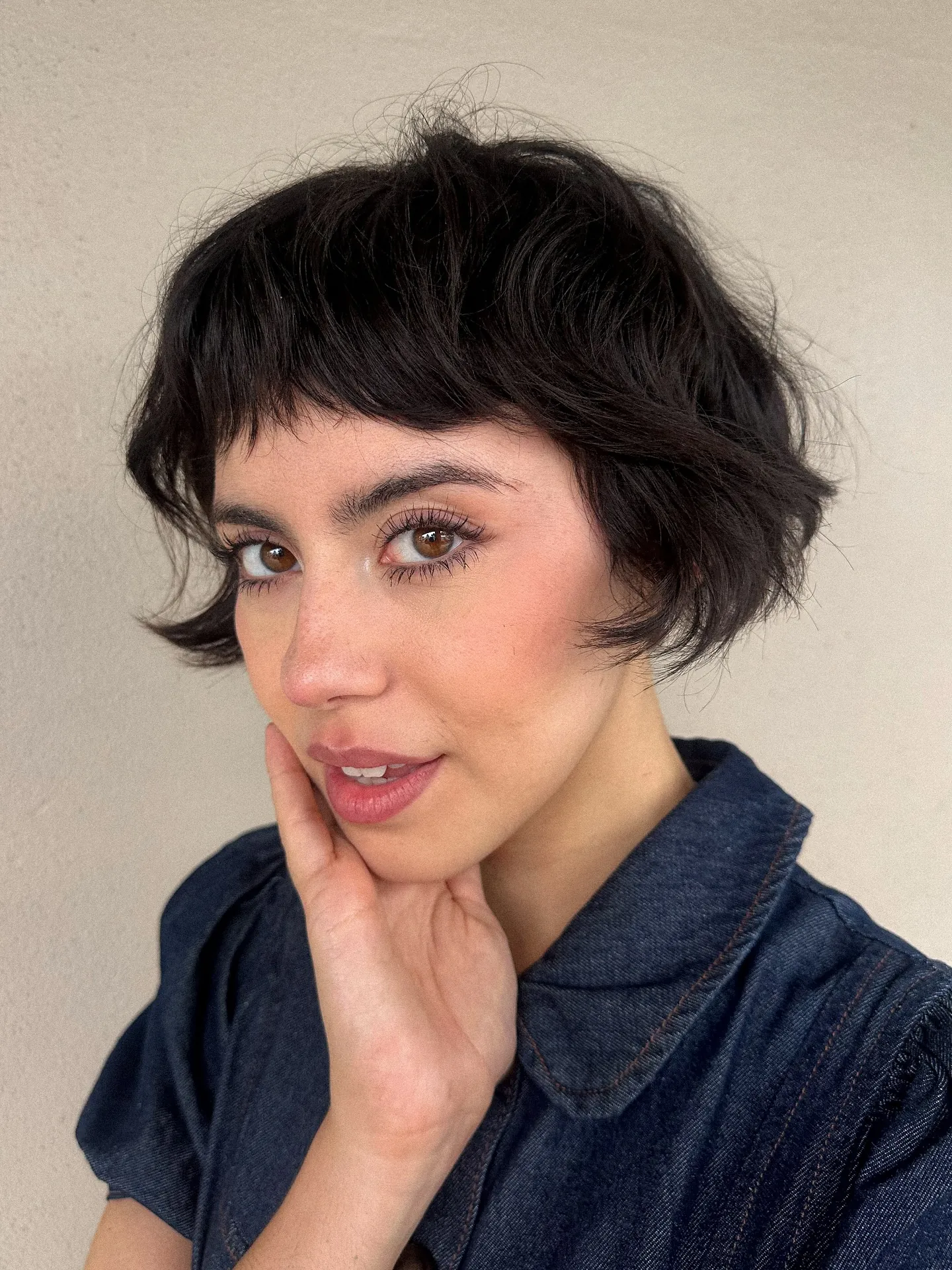 Tousled black bixie with wispy layers