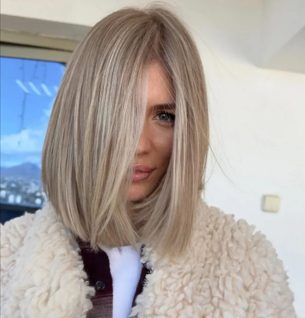 Light blonde angled lob with longer front pieces