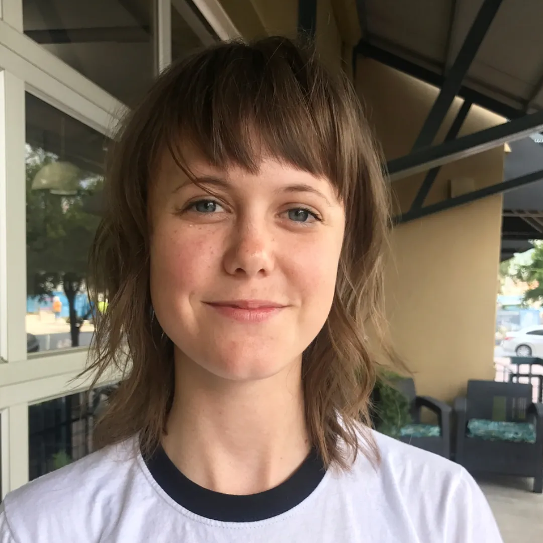 Short wolf cut with wispy fringe and shaggy layers