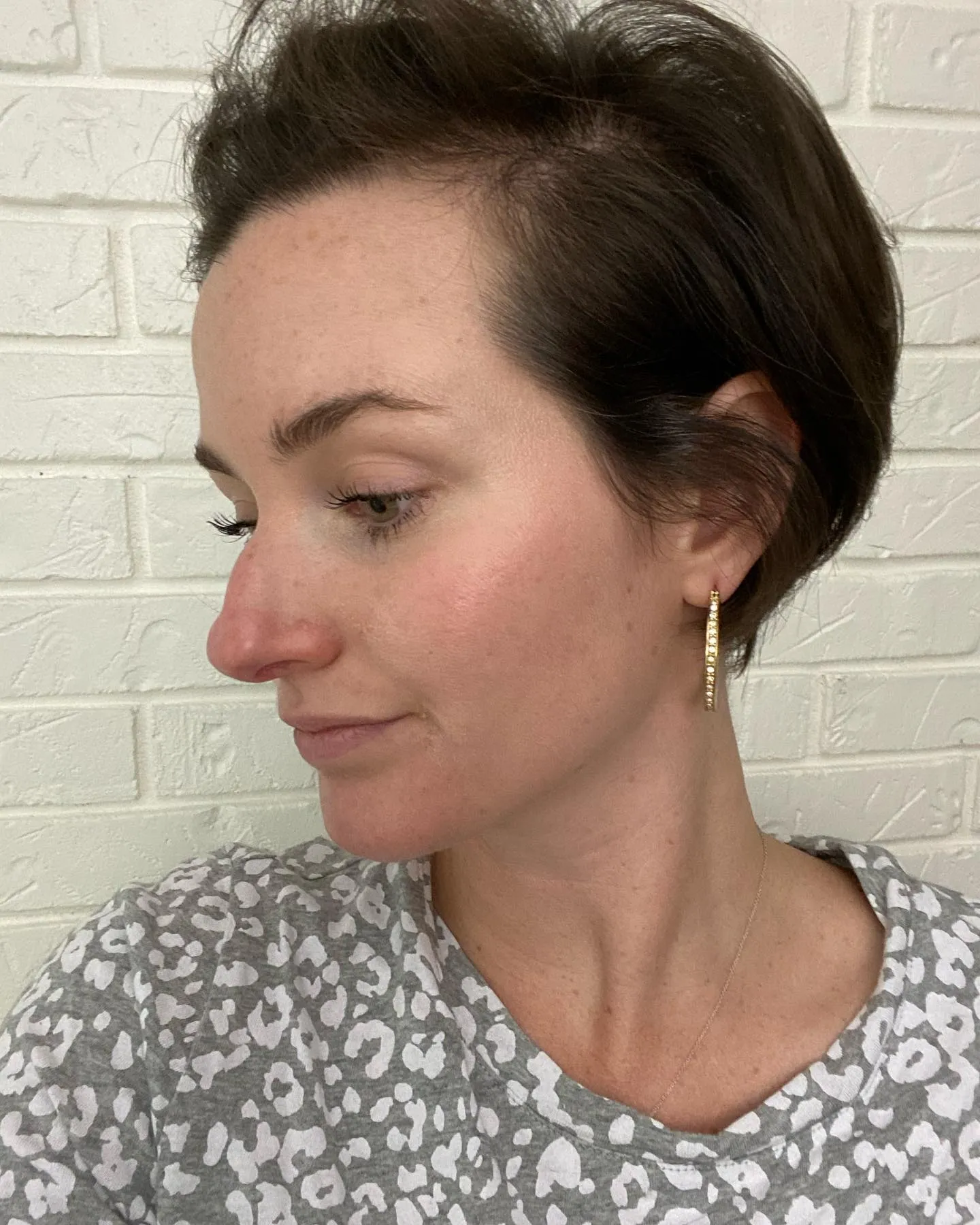 Dark side-swept pixie with volume through the top