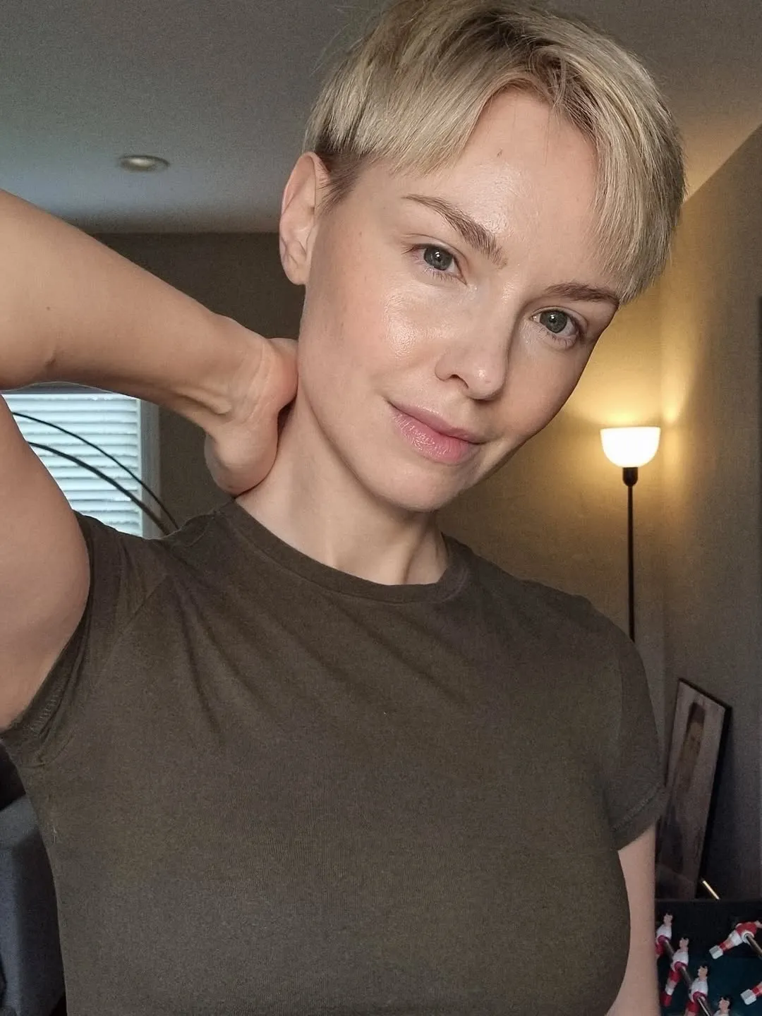 Short blonde pixie crop with wispy side-swept fringe