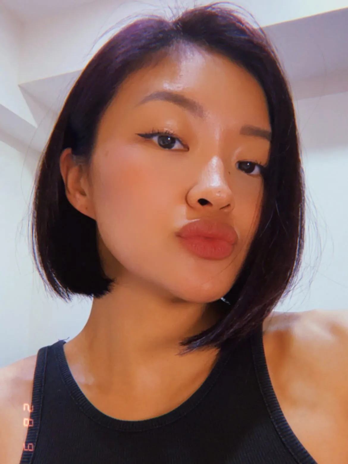 Sleek asymmetrical bob with a longer front section