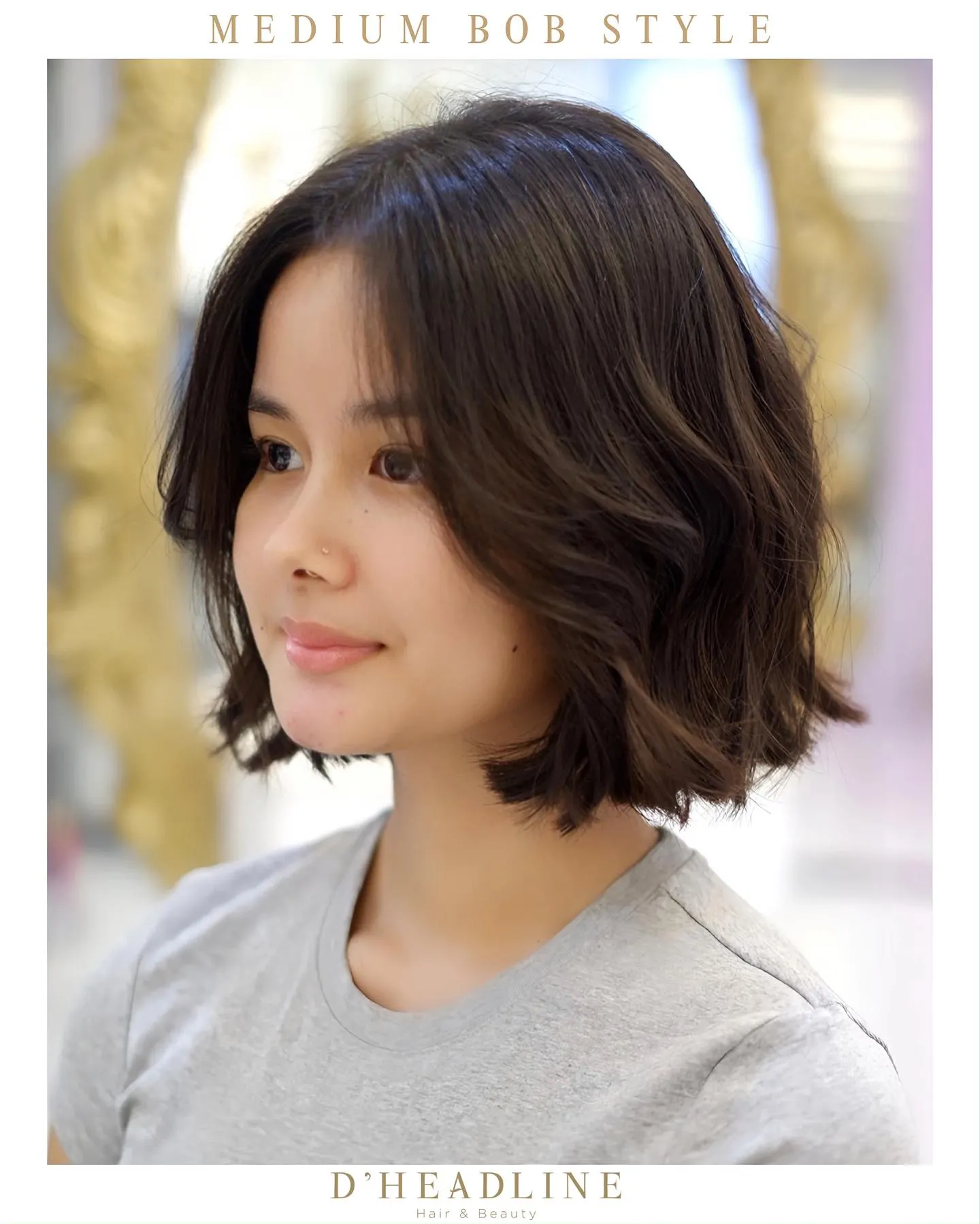 Rounded wavy medium bob with a soft side part and tucked textured ends