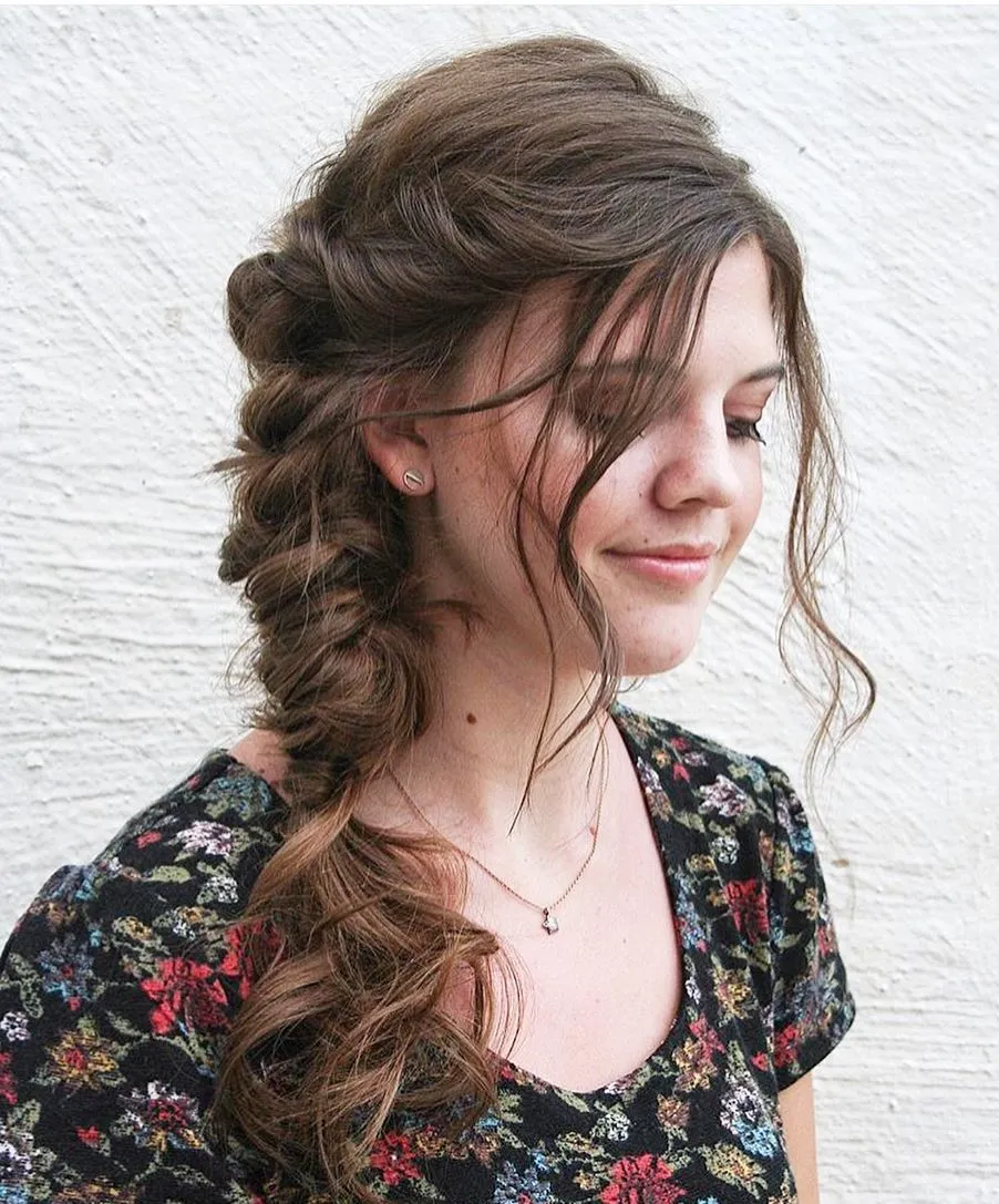 Loose textured side braid with soft face-framing strands