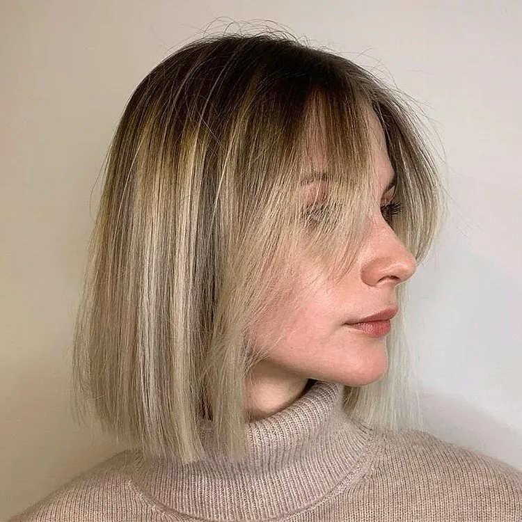 Straight bob with a soft wispy fringe and light face framing