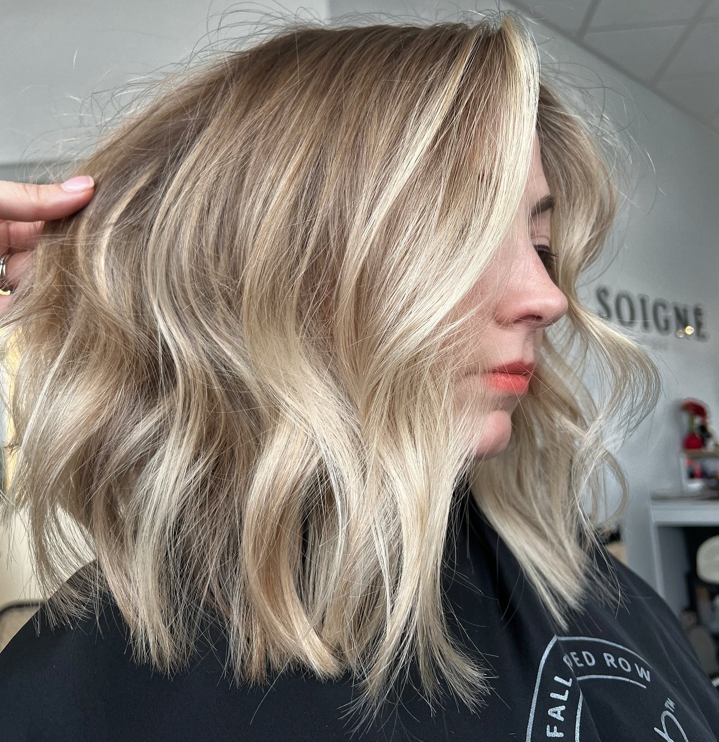 Centre-parted tousled lob with loose waves and textured ends