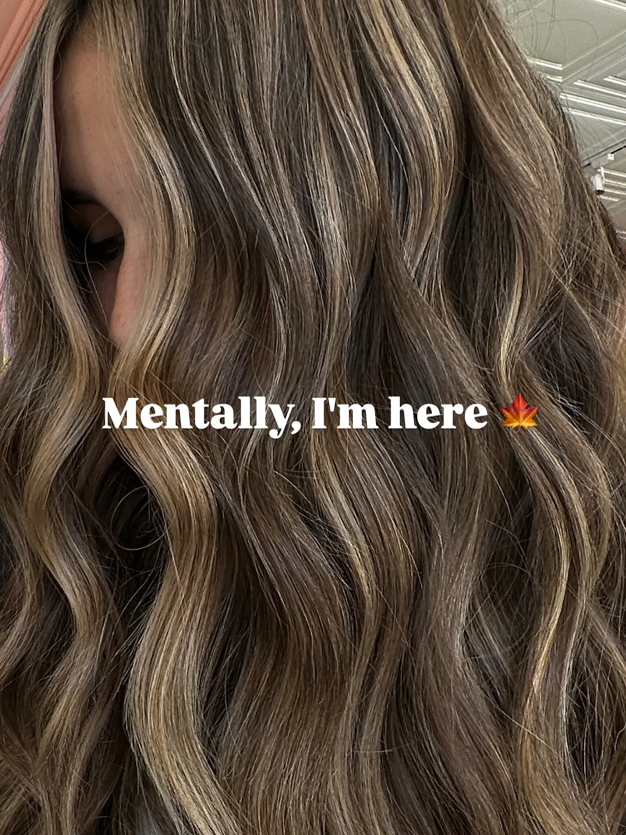 Brunette waves with cool bronde ribbon highlights