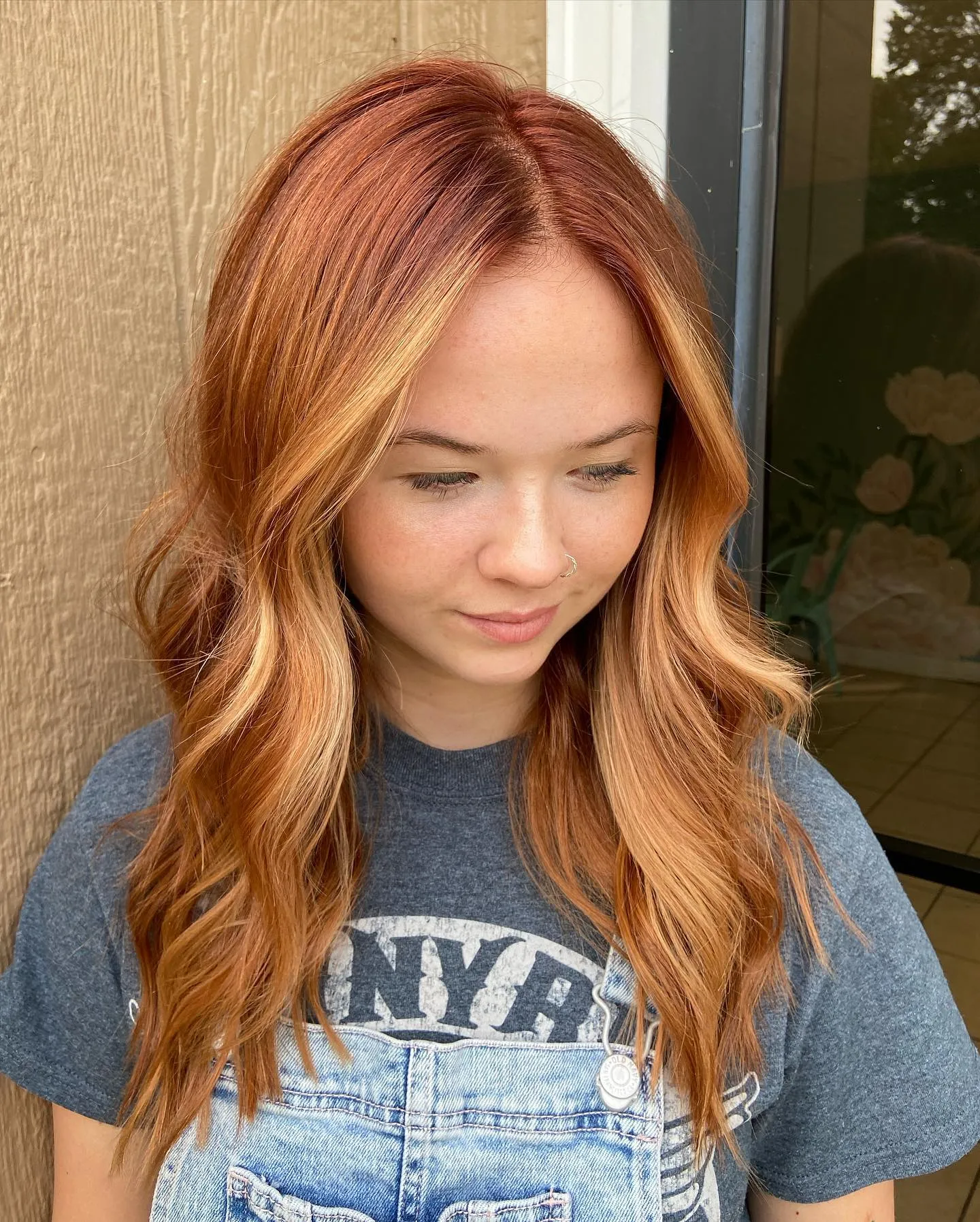 Copper hair blended into golden blonde lengths