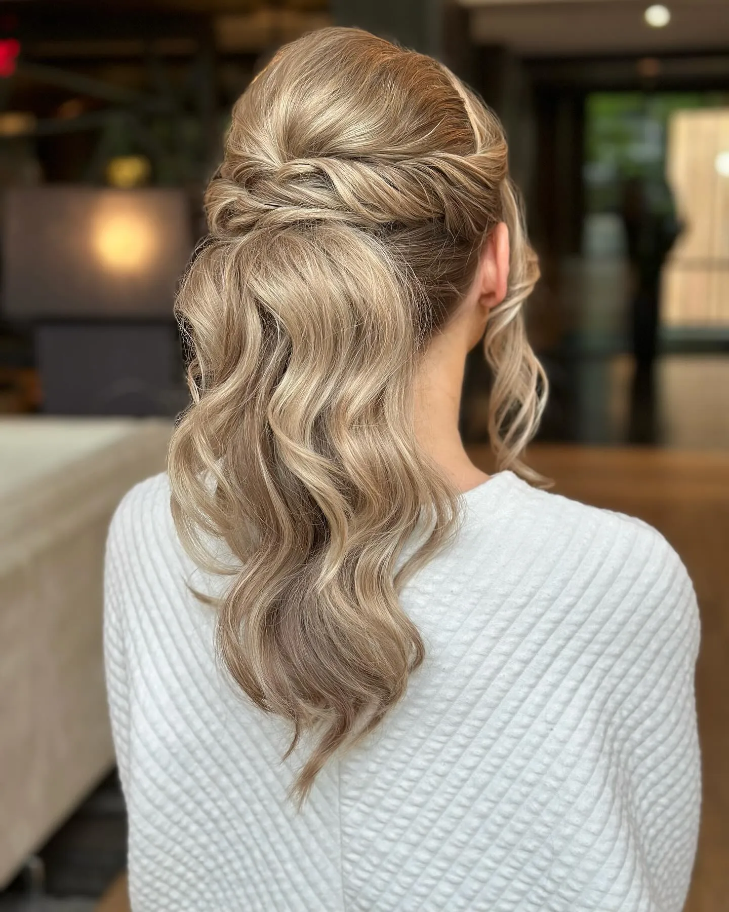 Voluminous half-up waves with a smooth crown
