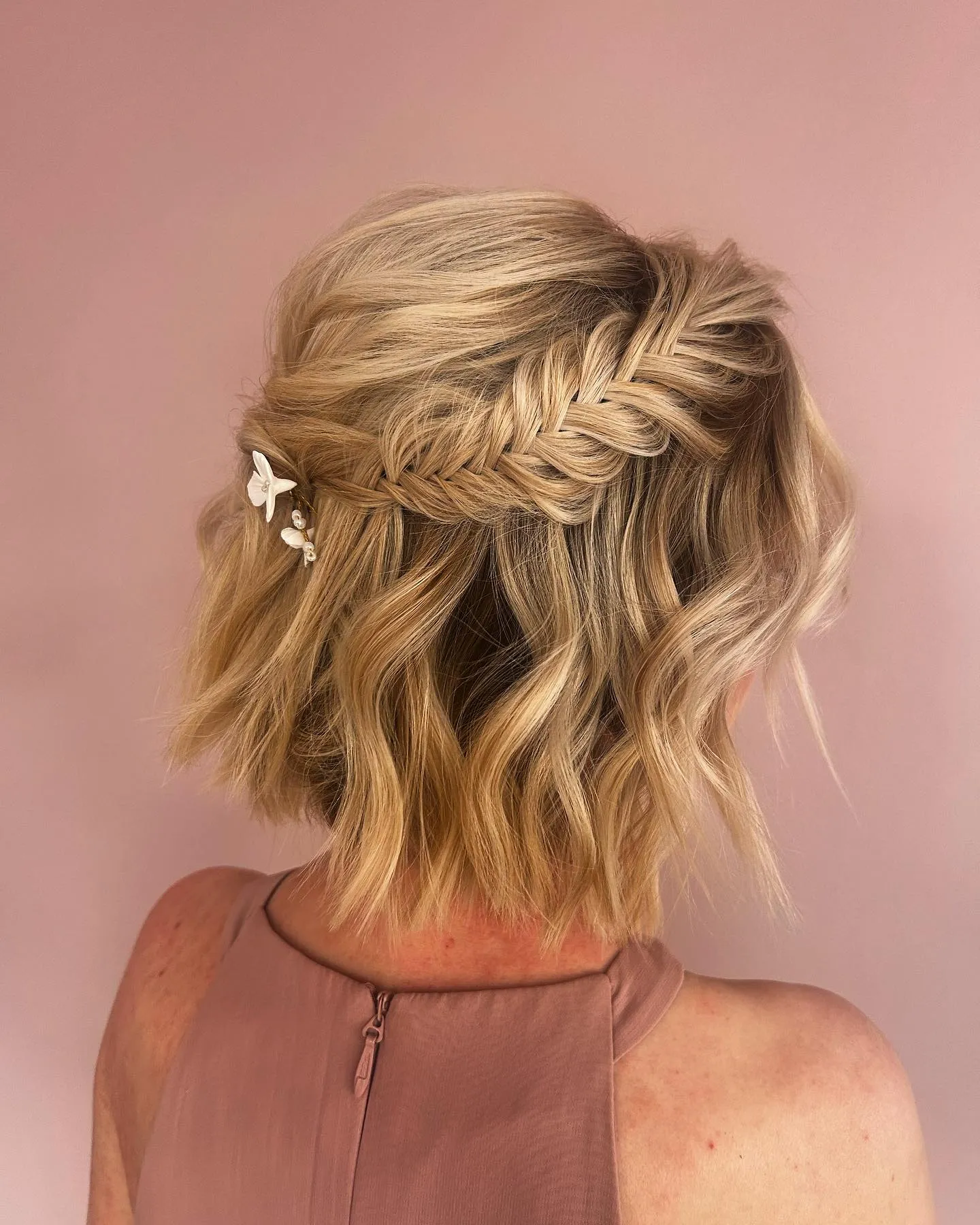 Rope-braided half-up bob with small flowers