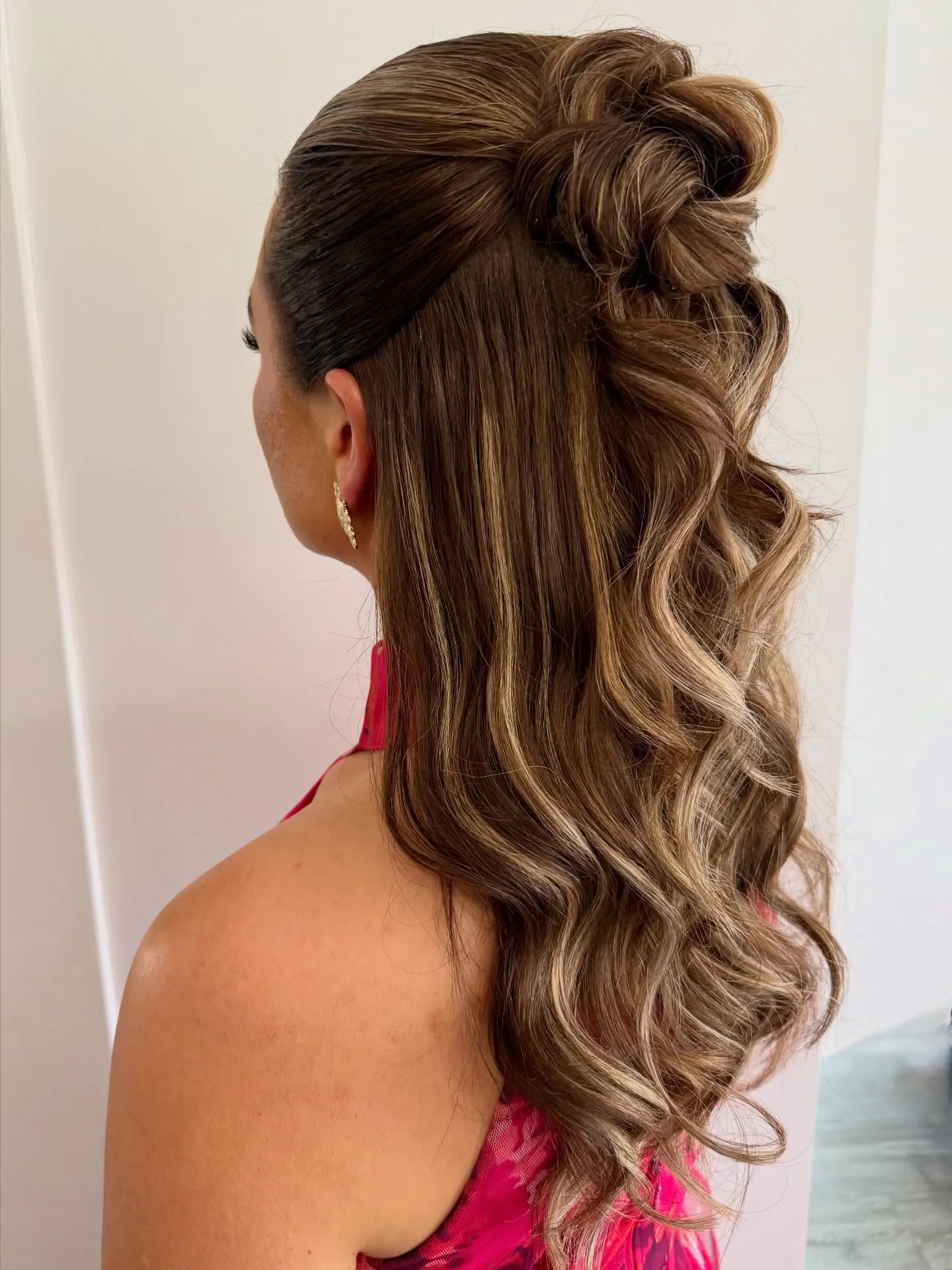 High wavy ponytail with wrapped base