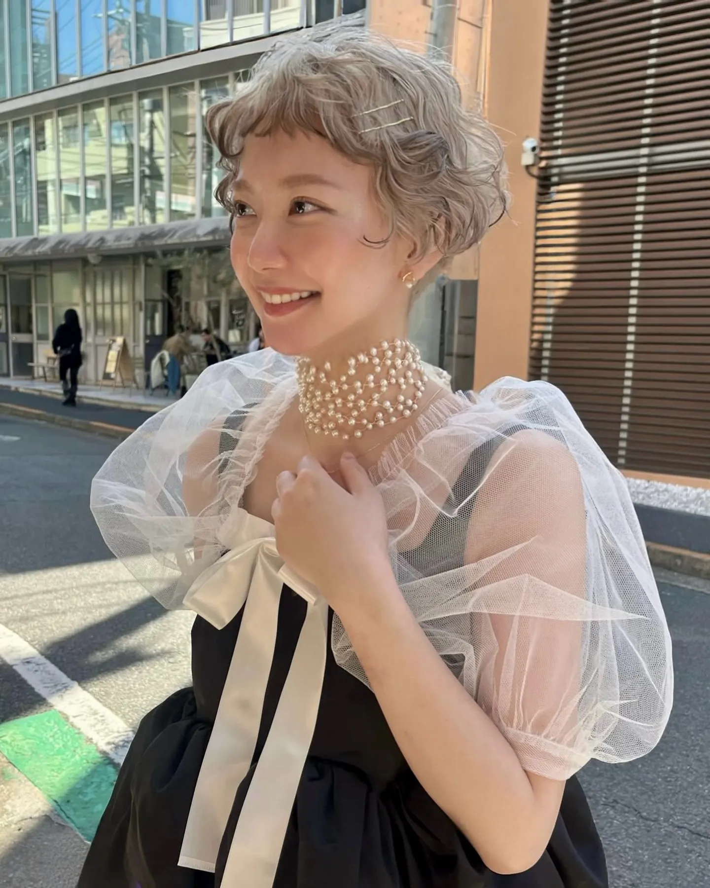 Curly pixie cut with soft rounded texture