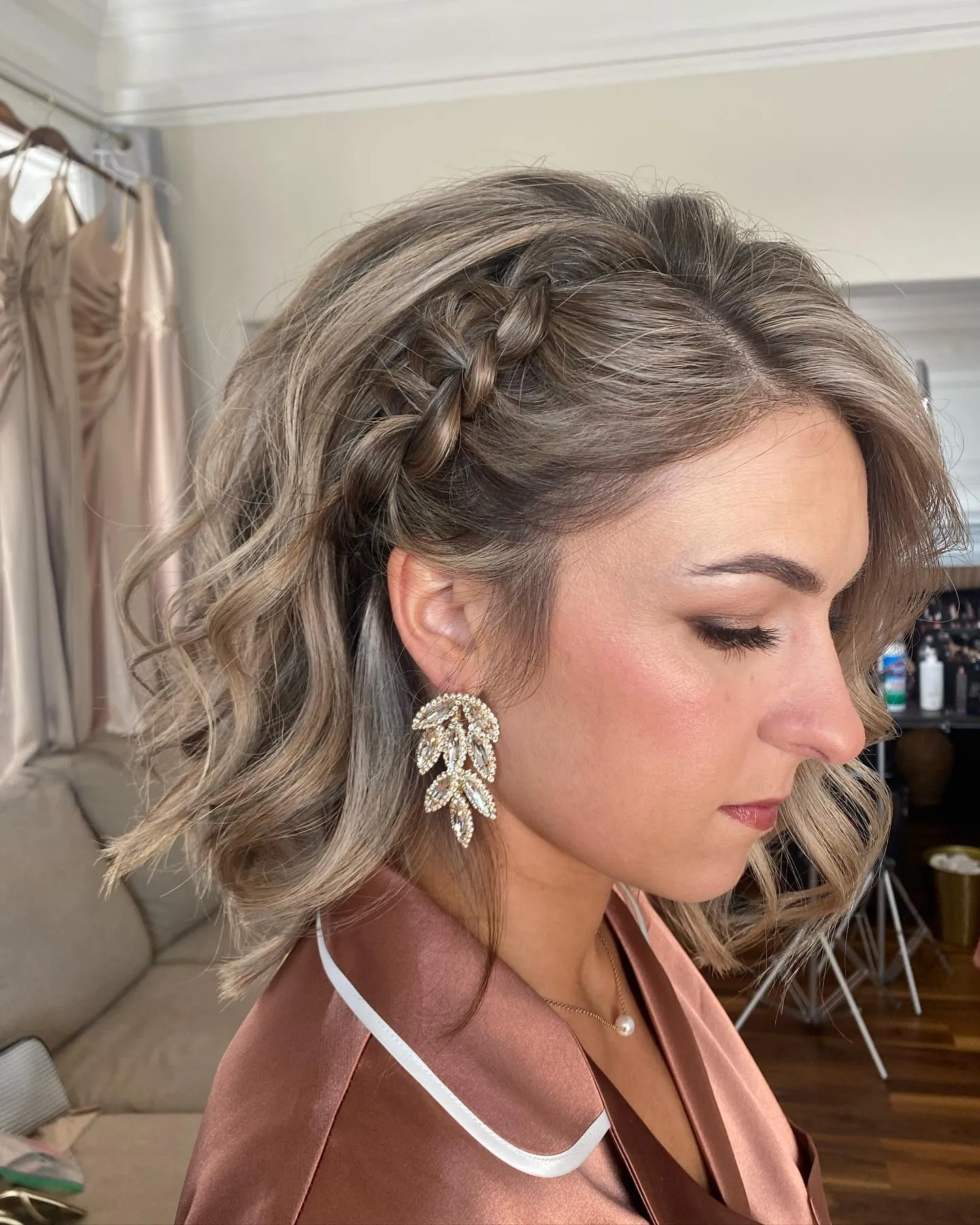 Short wavy bob with a braided side section