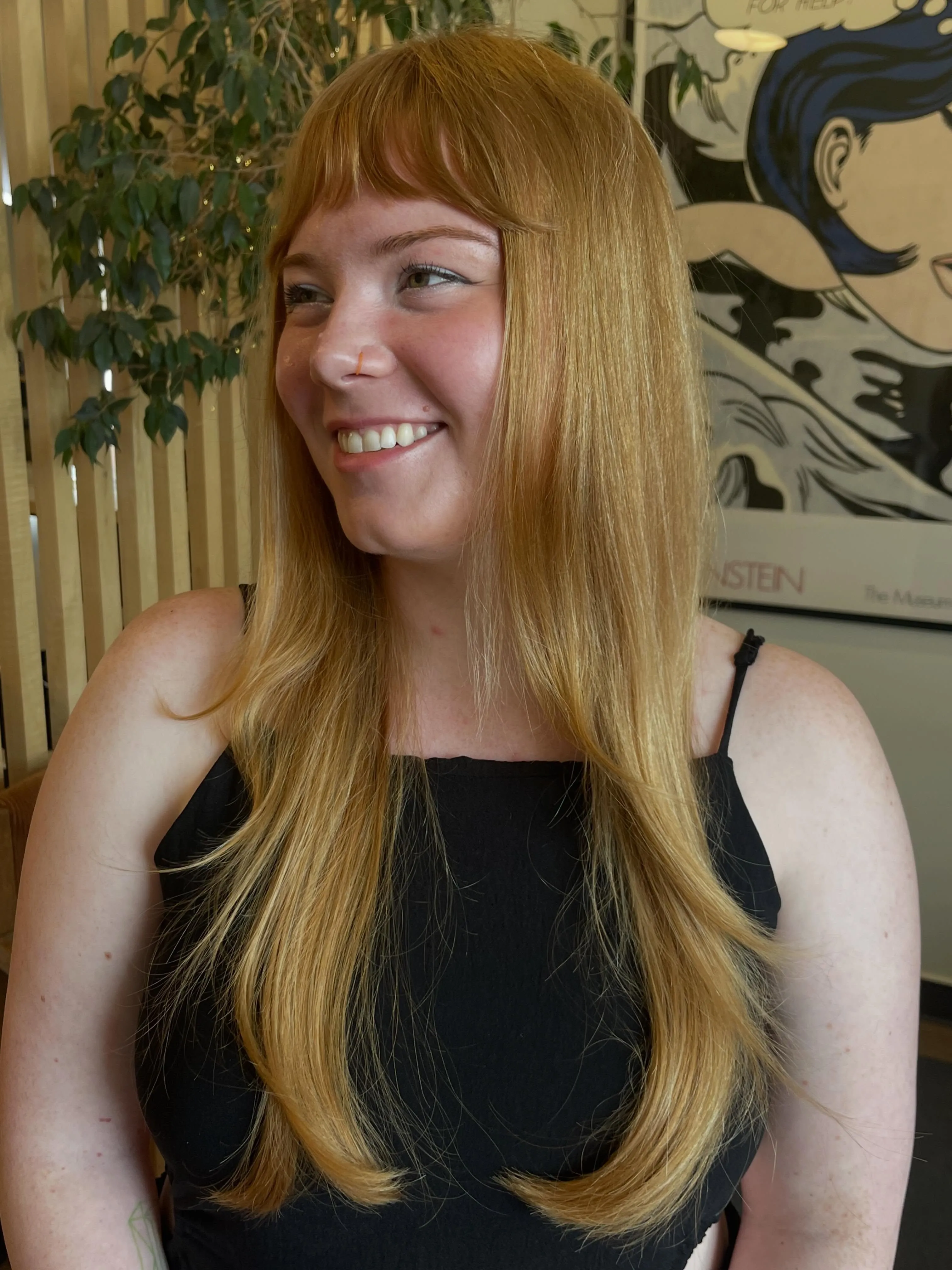 Long straight copper hair with a short rounded fringe