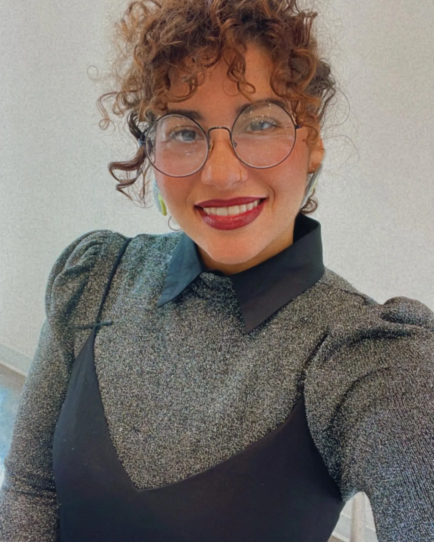 Curly high updo with natural curly fringe and loose ringlets