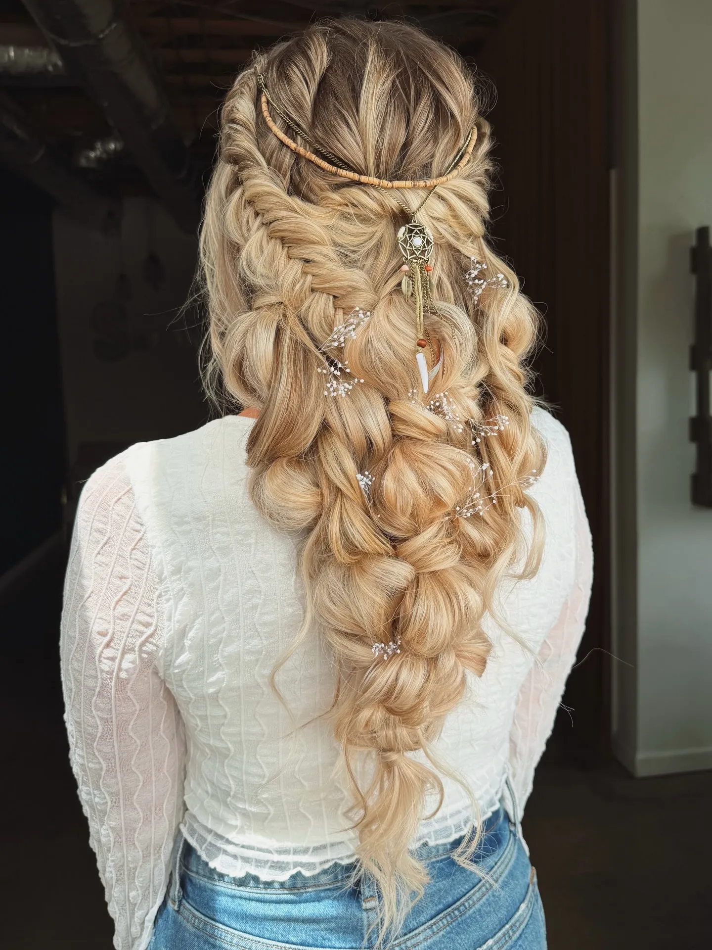Long fishtail bridal braids with celestial hair jewellery