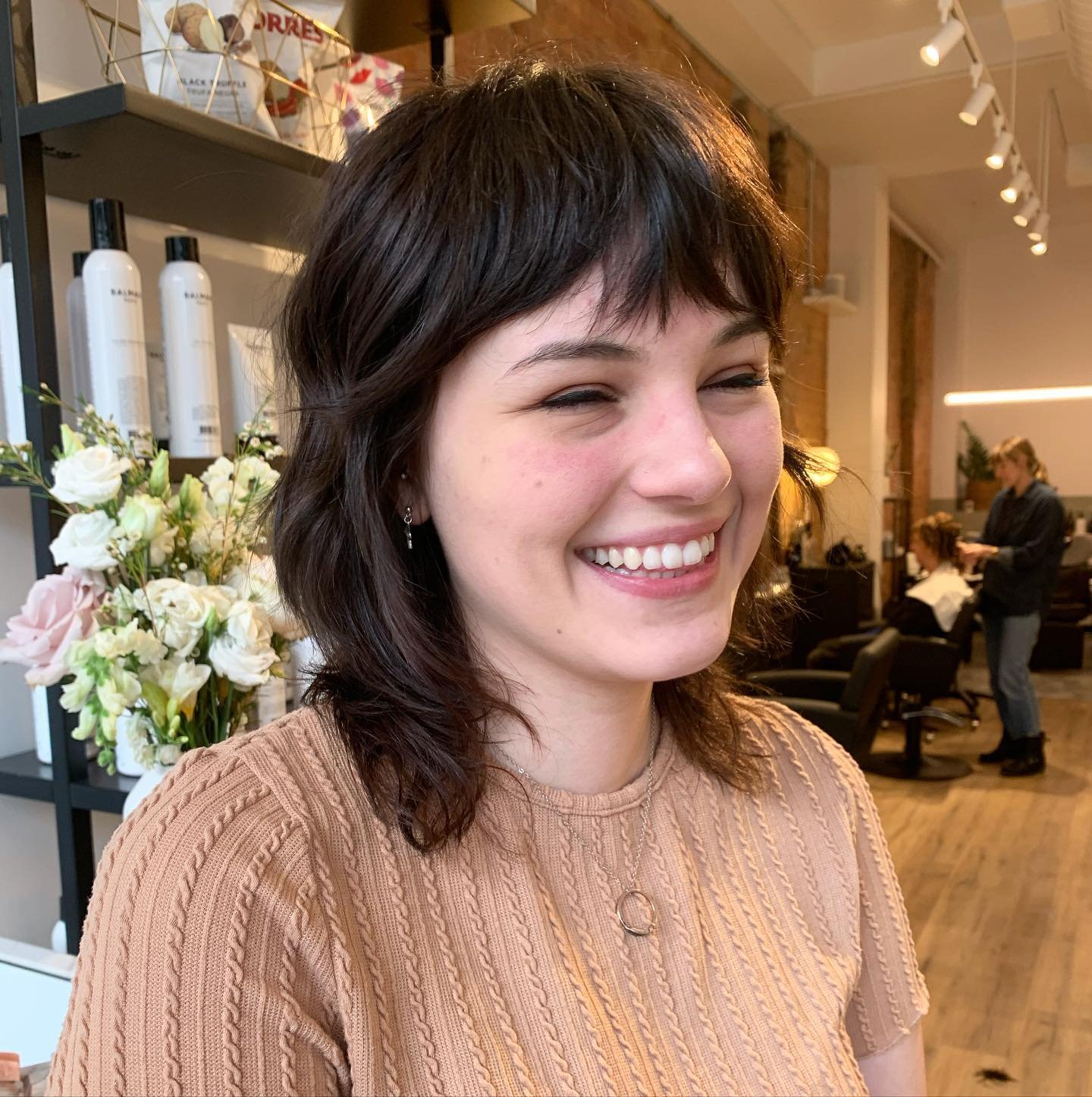 Short shaggy wolf cut with piecey fringe and textured sides
