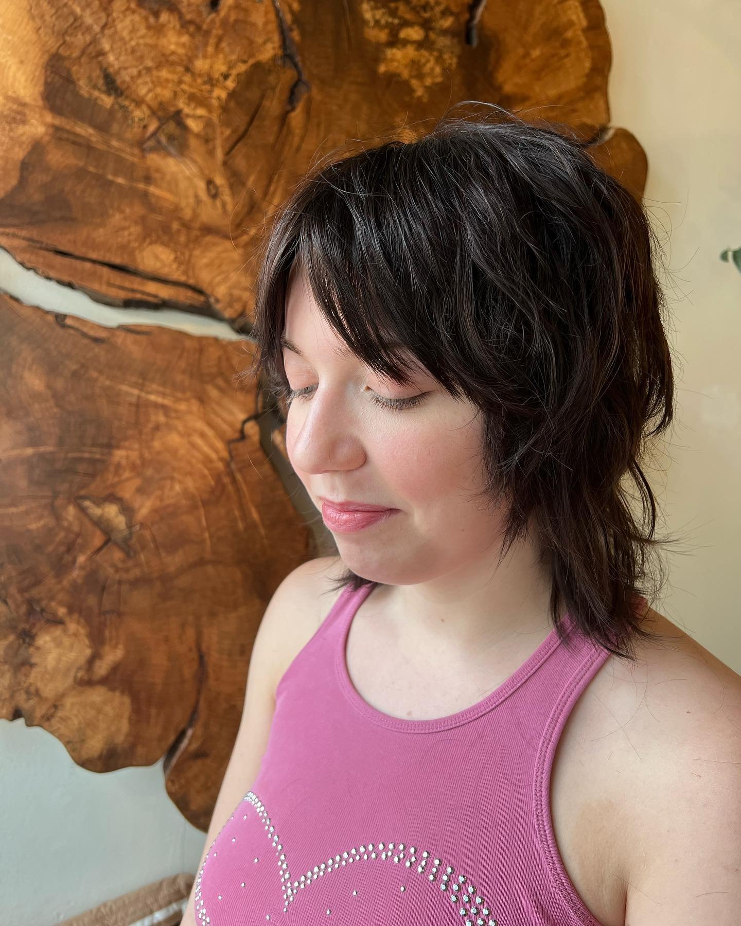 Wavy short wolf cut with side-swept layers and textured ends