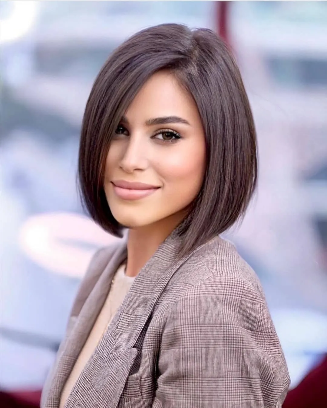 Smooth side-parted A-line bob with curved ends