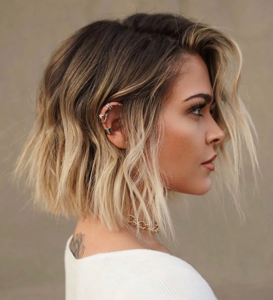 Tousled layered A-line bob with soft waves