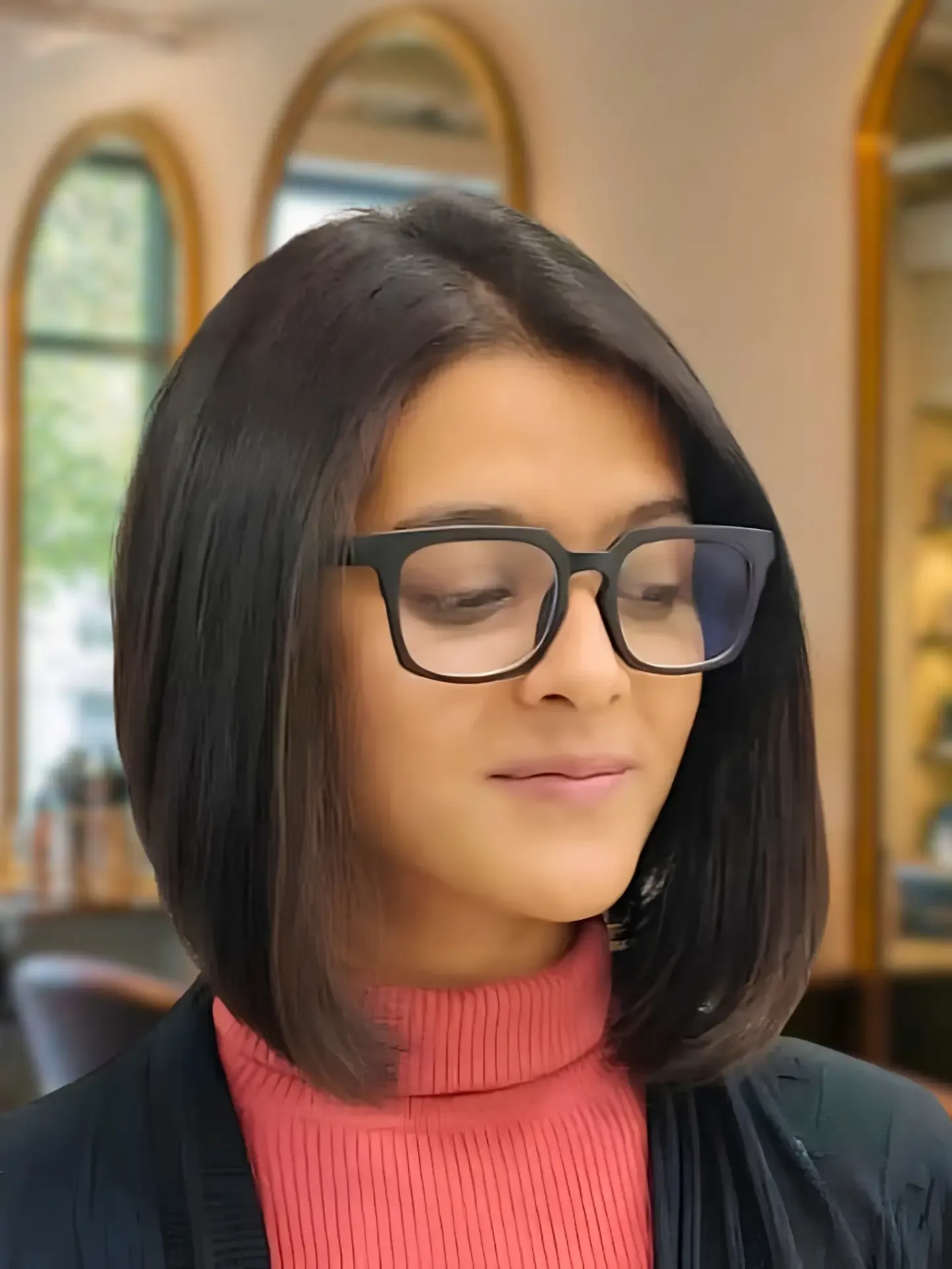 Sleek long A-line bob with center part