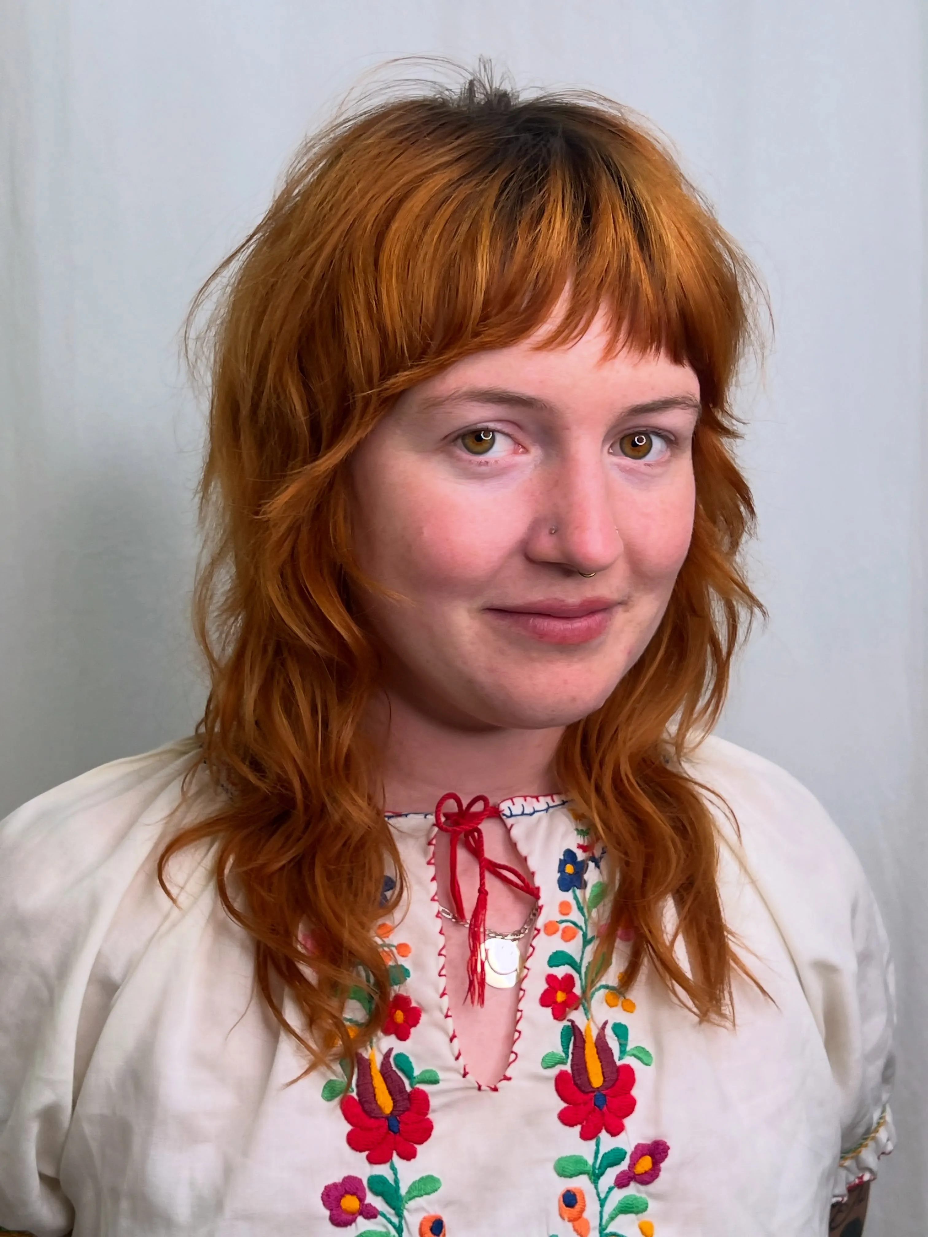 Copper textured shag with short fringe and longer wavy ends