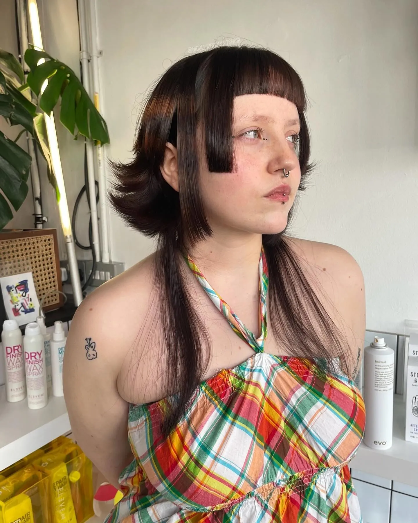 Long haircut with blunt micro fringe, face blocks and flipped lower layers