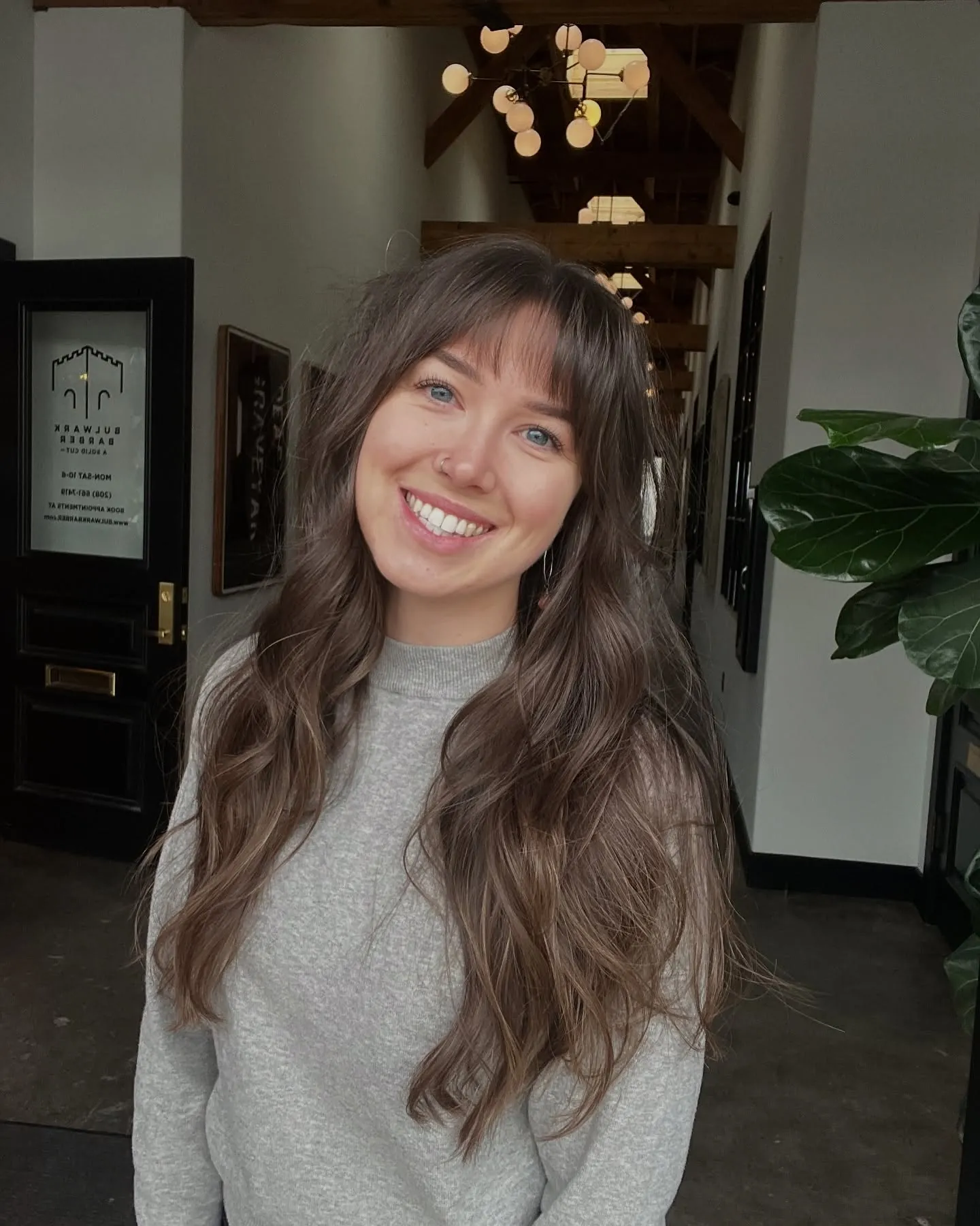 Long wavy hair with soft separated fringe