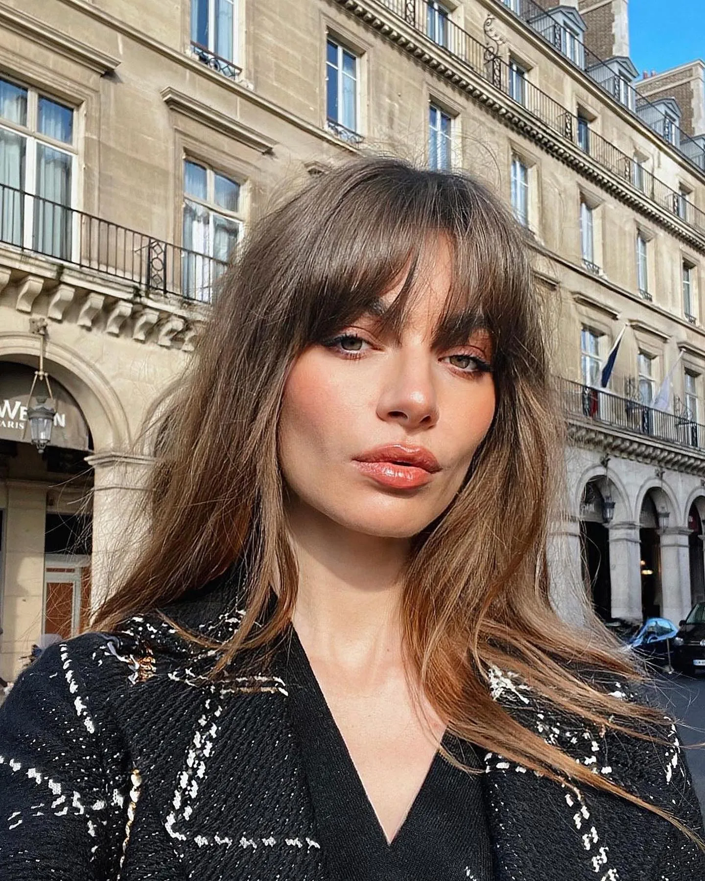 Long straight hair with wispy Birkin bangs