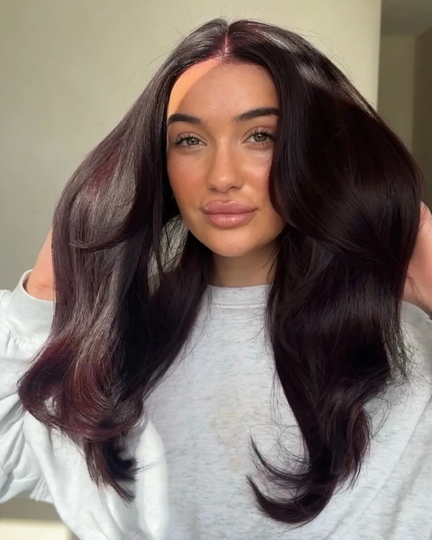 black cherry hair with bouncy face framing