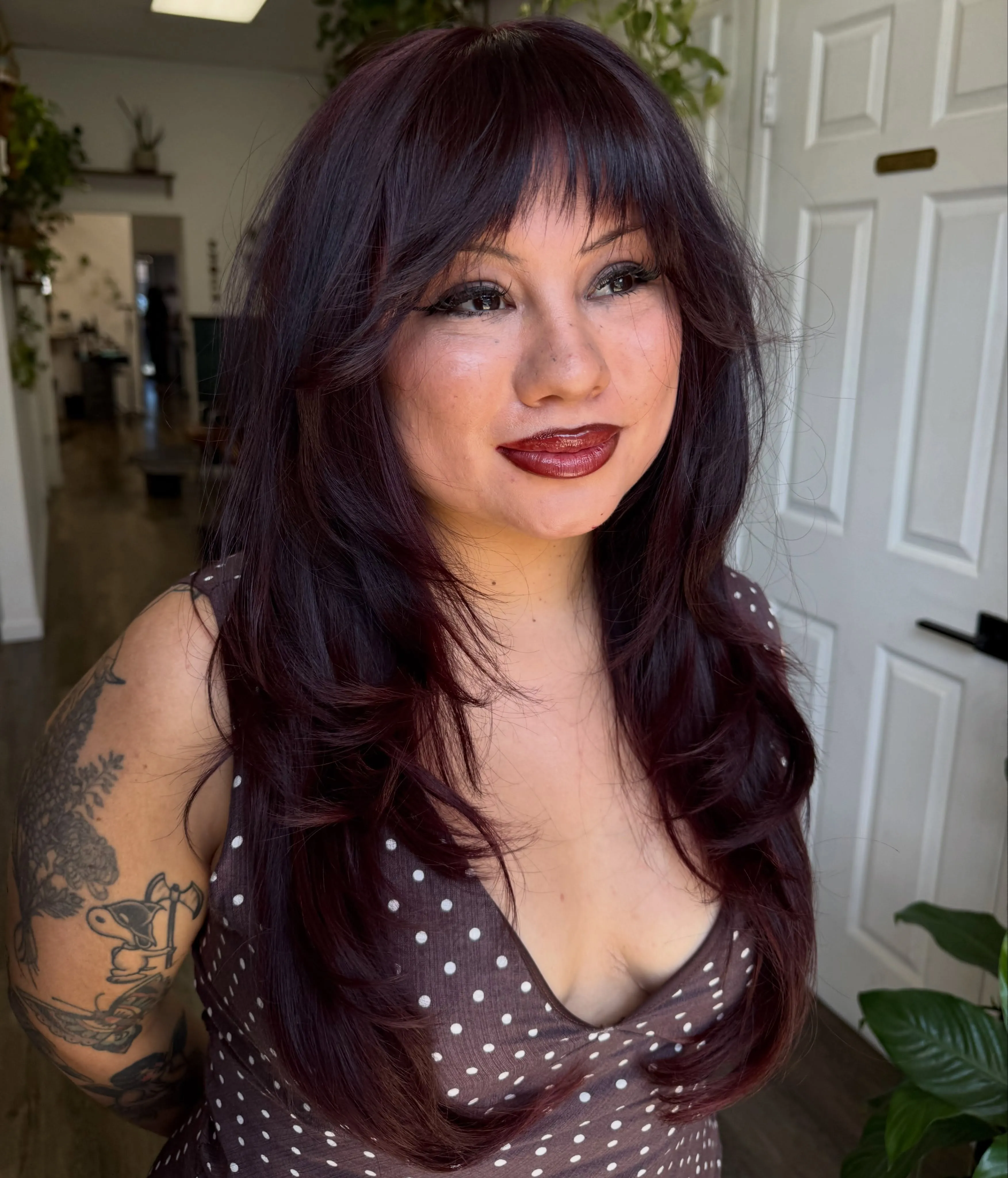 black cherry hair with shaggy fringe layers
