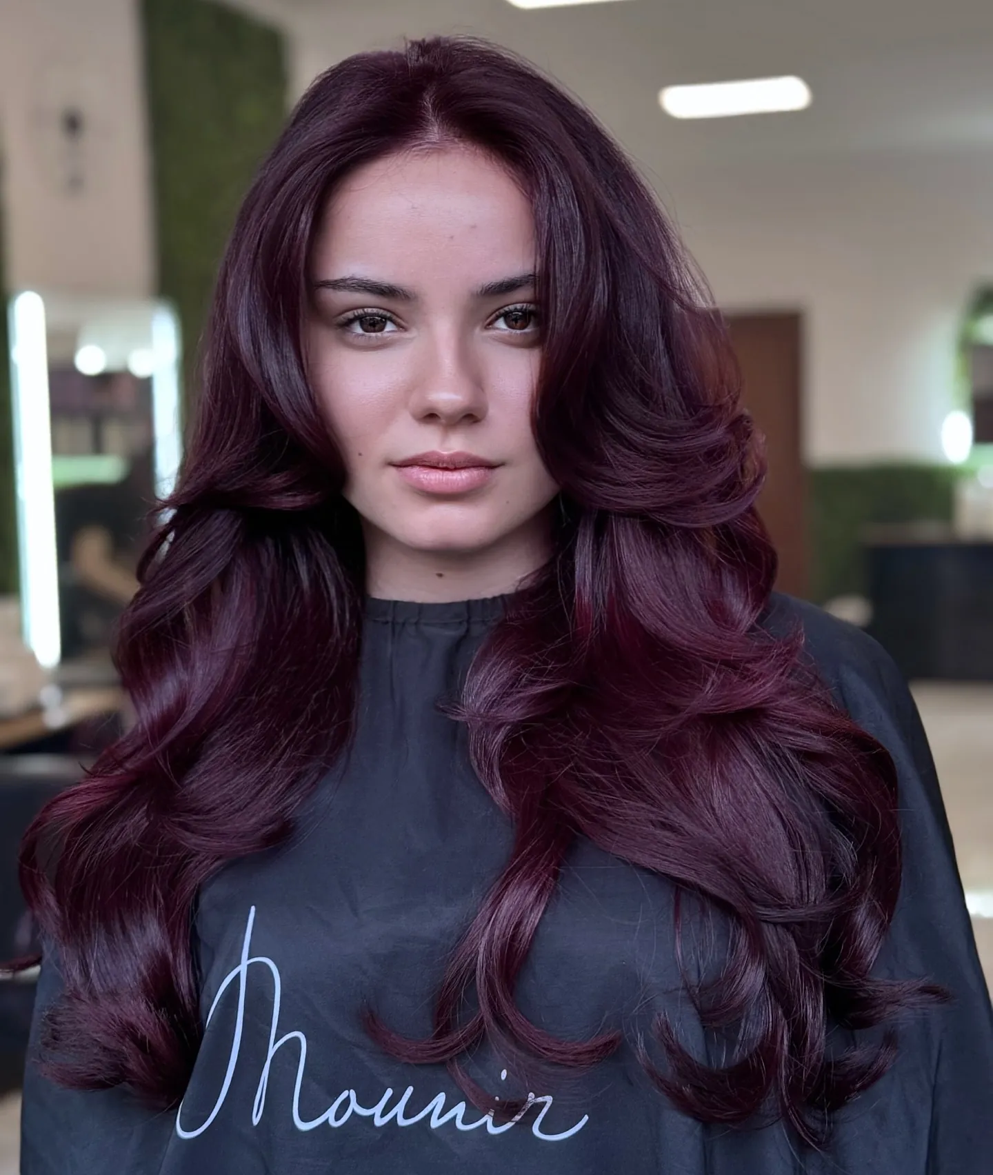 black cherry hair with voluminous layered waves