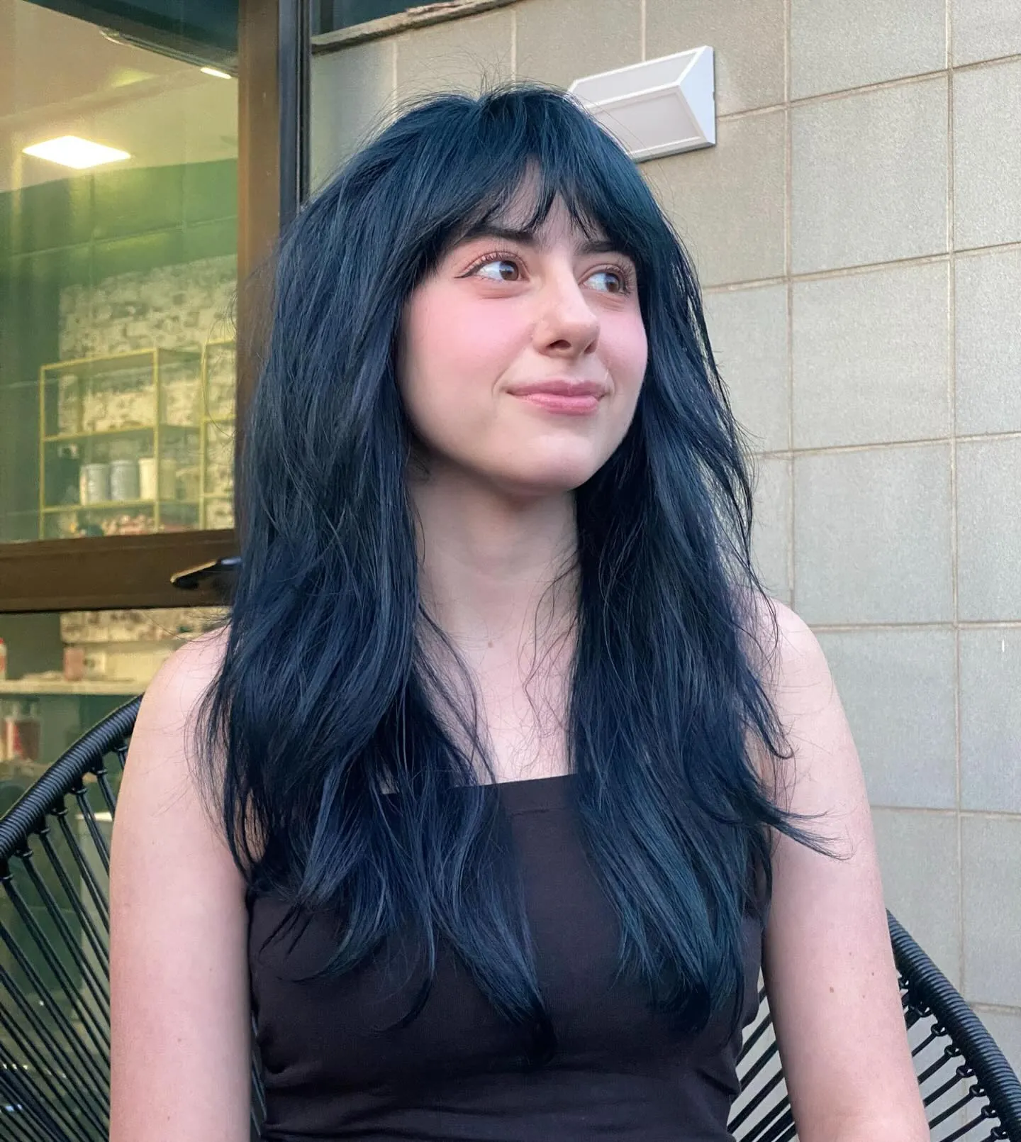 Long Blue-Black Layers showing blue black hair colour