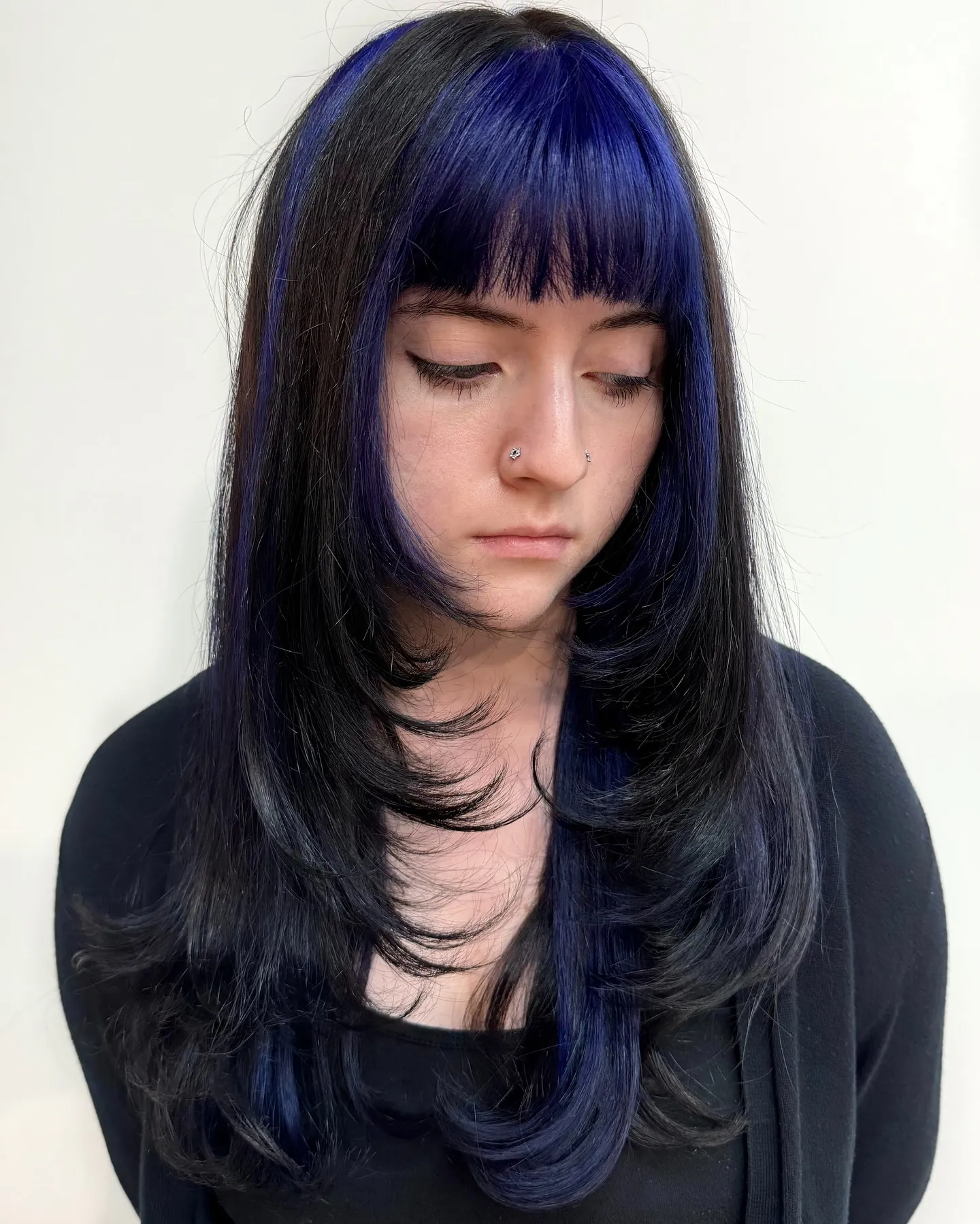 Long Blue-Black Fringe showing blue black hair colour