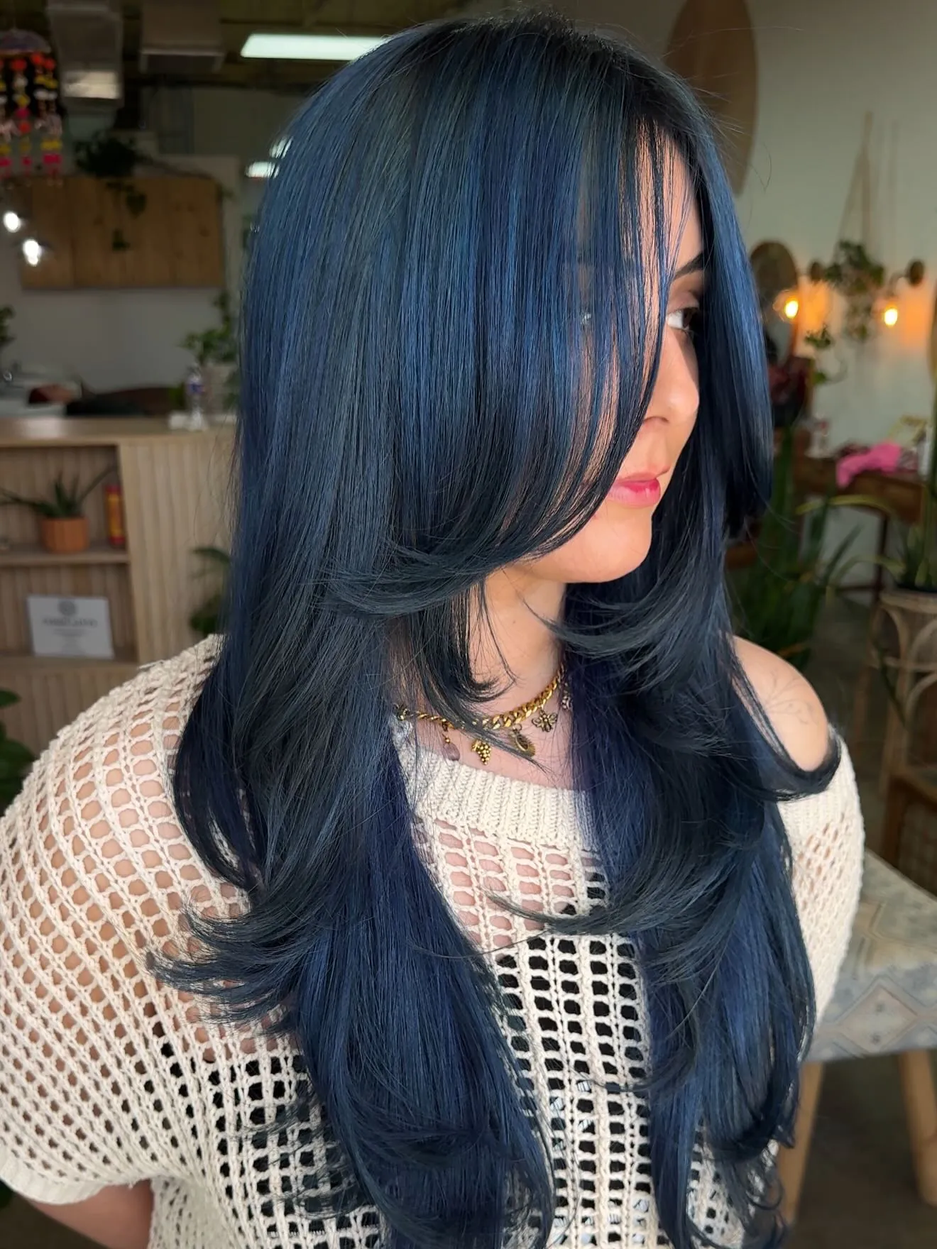 Long Blue-Black Face Layers showing blue black hair colour