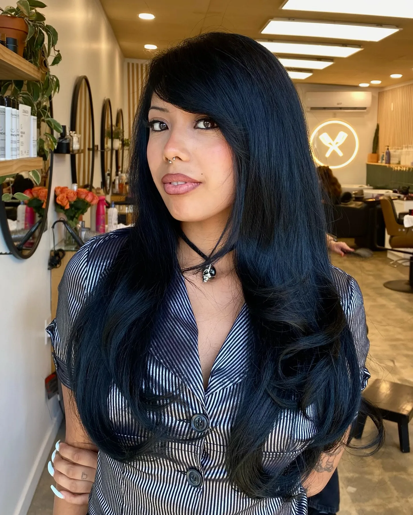 Blue-Black Layered Blowout showing blue black hair colour