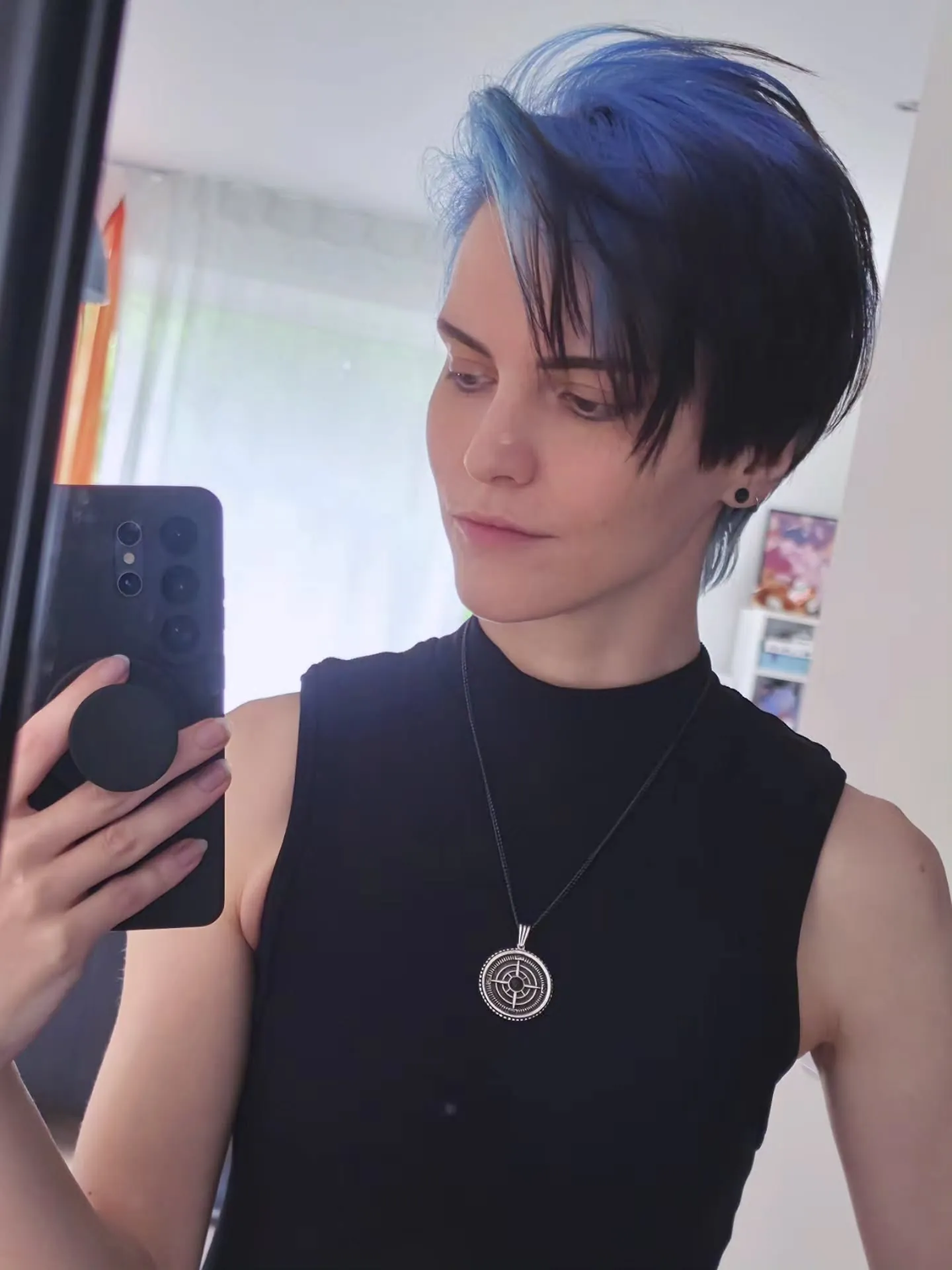 Side-Swept Blue Pixie showing blue black hair colour