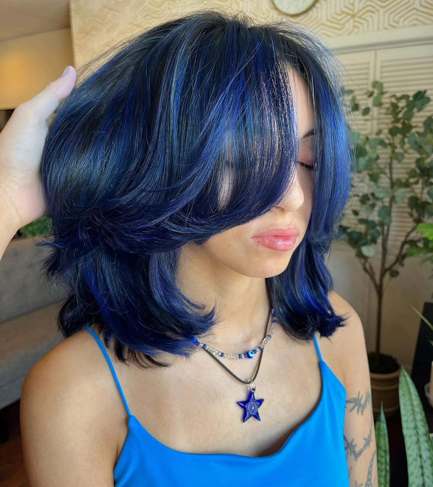 Blue-Black Curtain Lob showing blue black hair colour