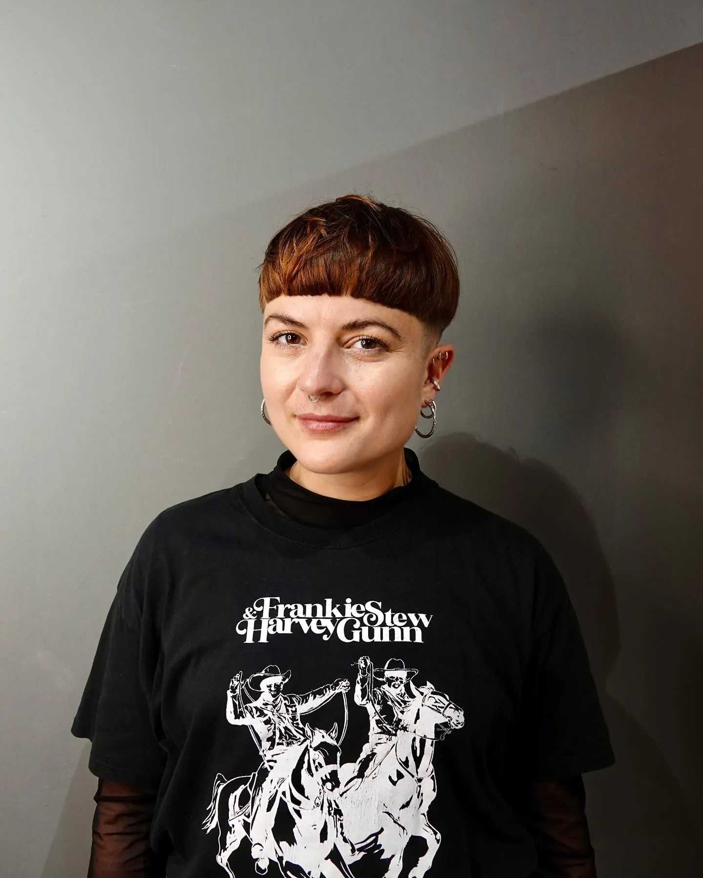 Soft auburn bowl crop with short fringe