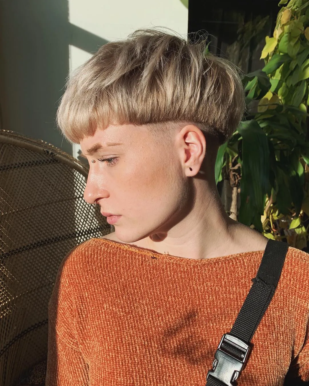 Brown bowl cut with high shaved sides