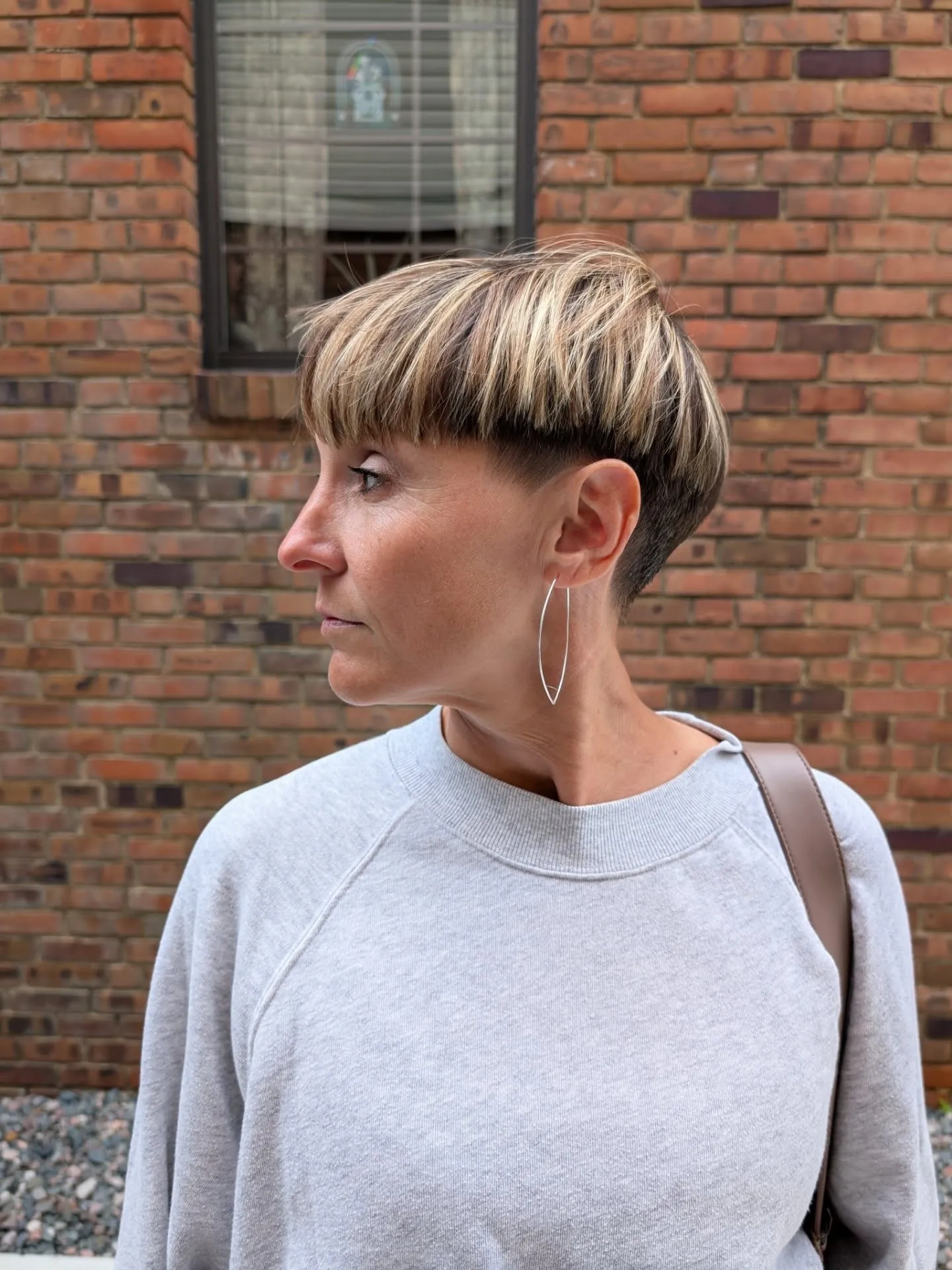Long brown bowl top with undercut sides