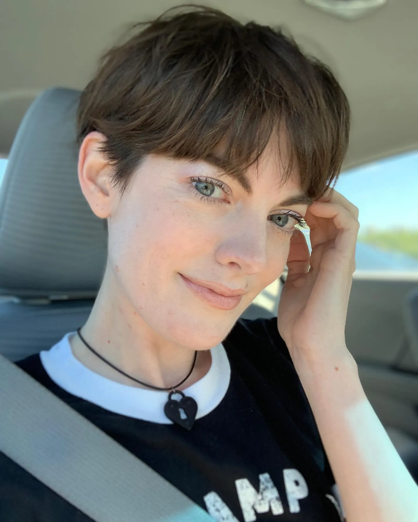 Wispy brown grown out bowl cut with soft fringe
