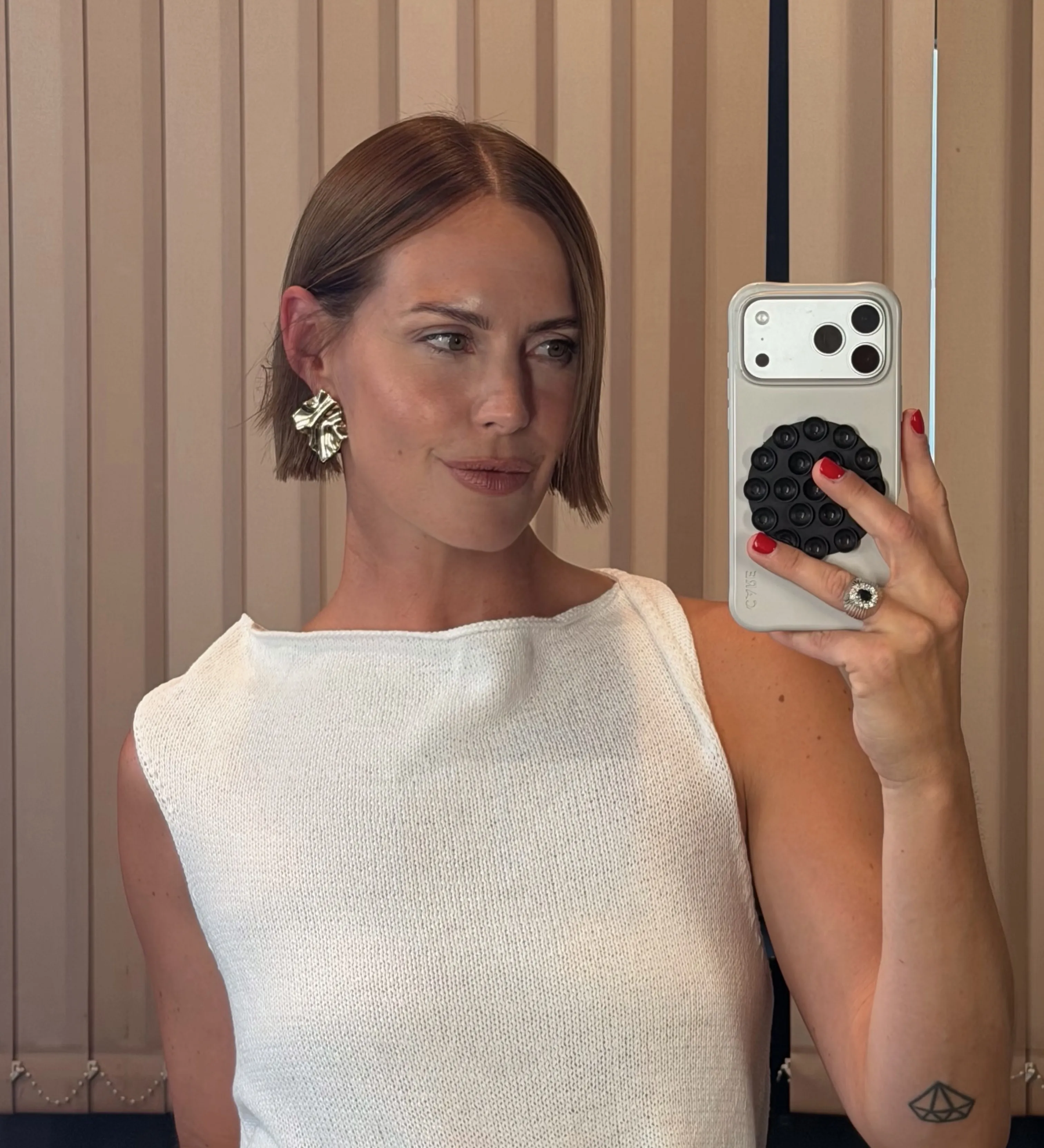 tucked sleek bob haircut