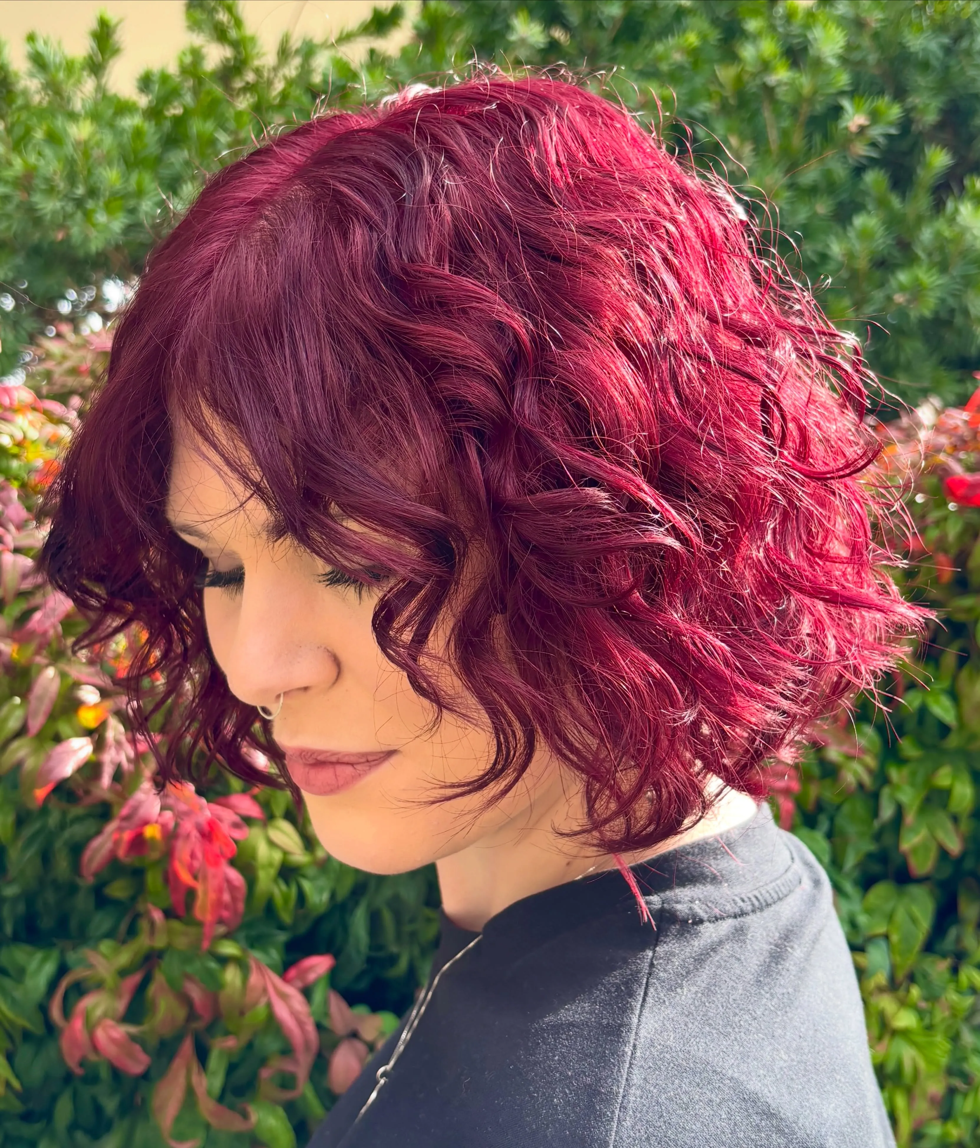 cherry red hair with curly short bob