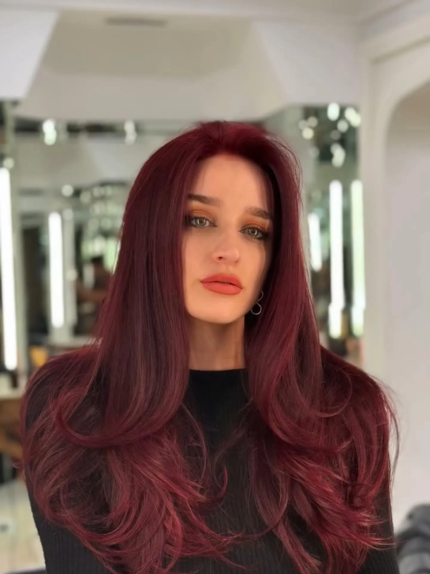 cherry red hair with center-part long waves