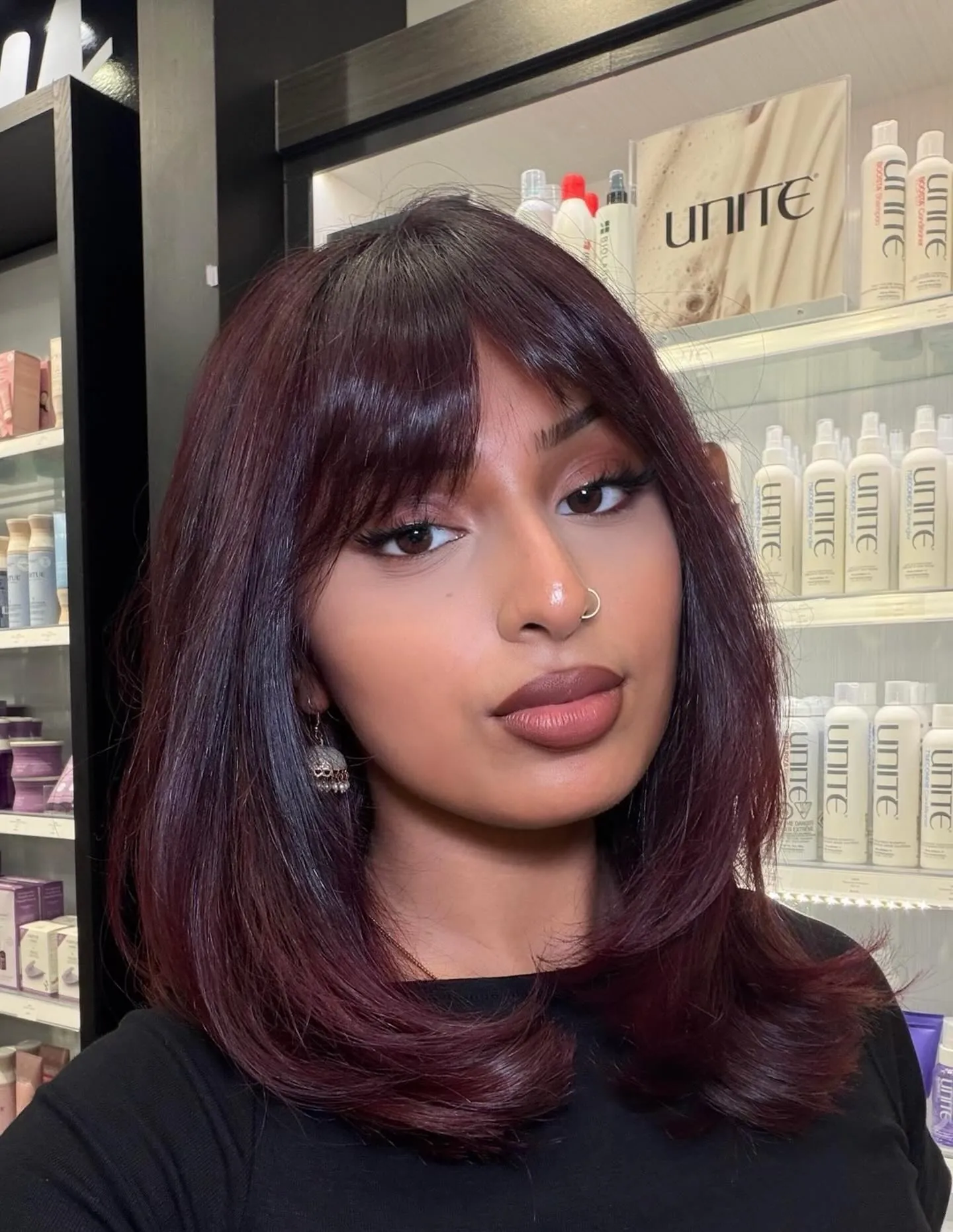cherry red hair with full fringe lob