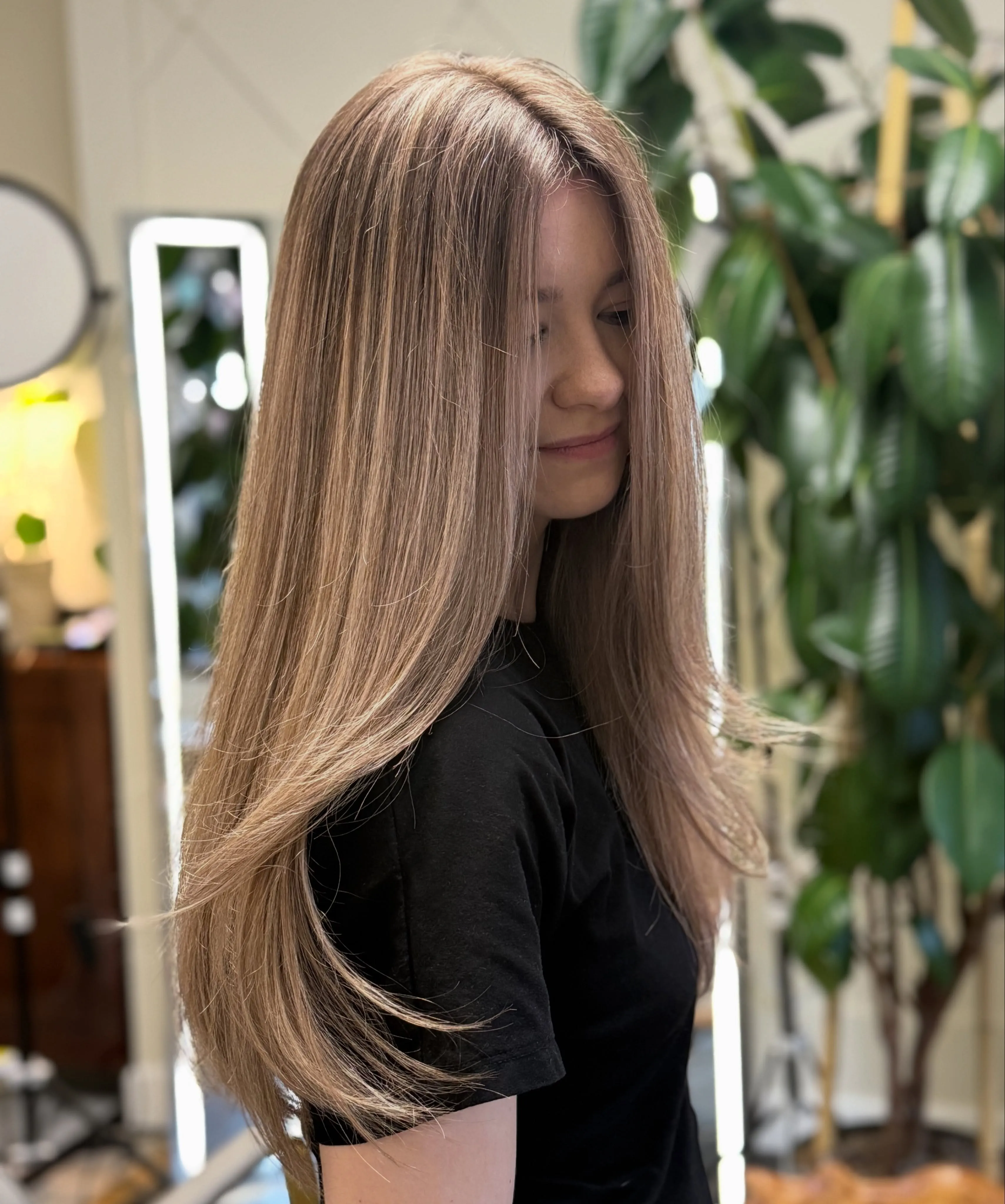 Straight long hair with subtle neutral brown and blonde dimension