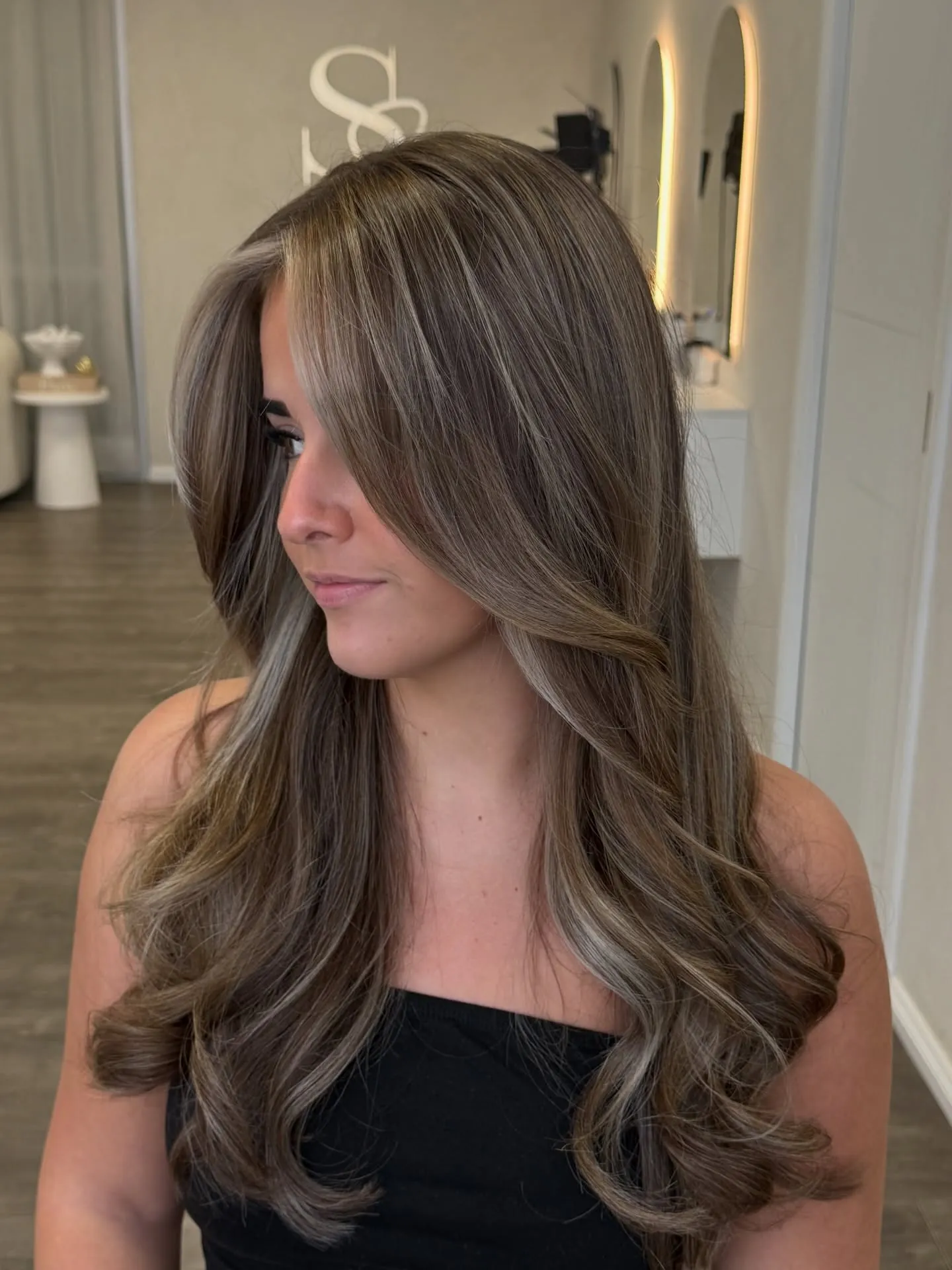Long smoky brown layers with soft highlighted ends