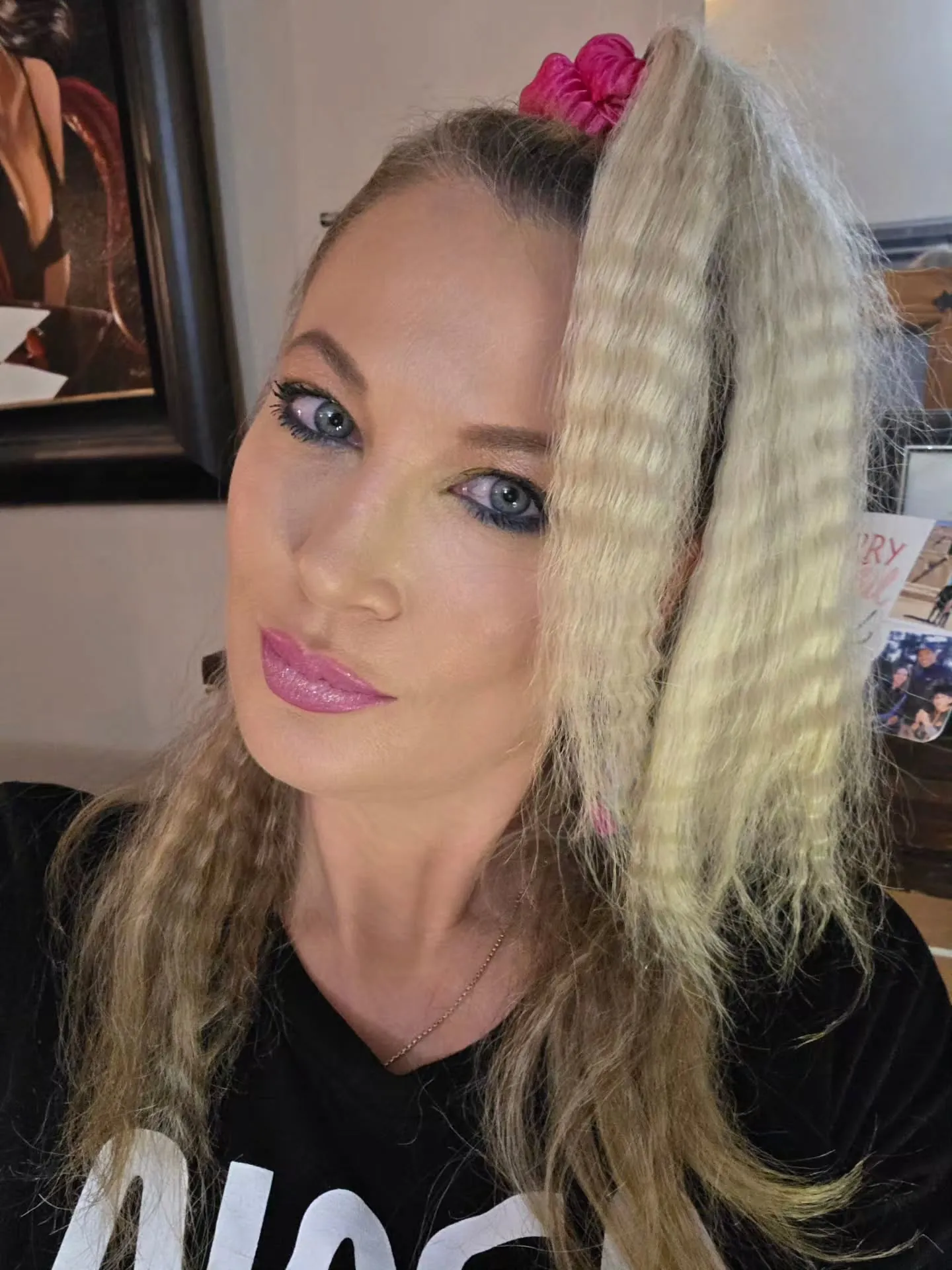 High ponytail with crimped blonde lengths